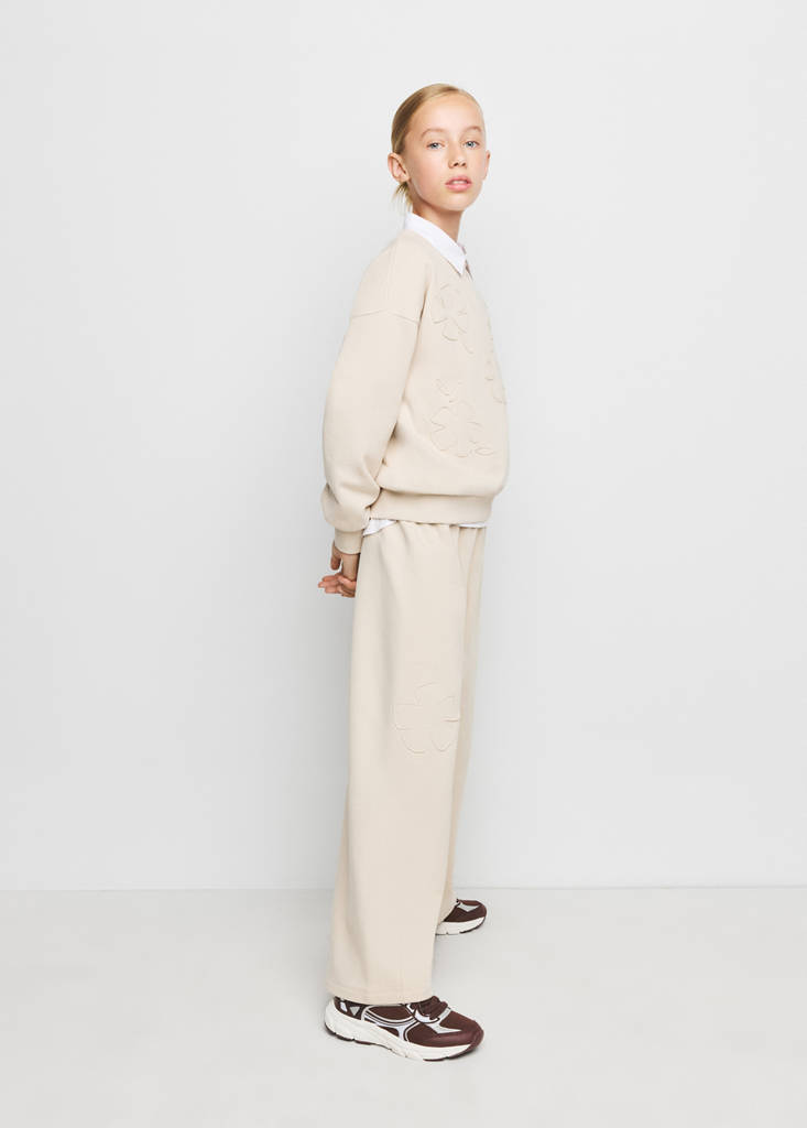 Spodnie jogger z haftowanym kwiatem kremowy / écru - Dzieci - 9-10 lata - MANGO KIDS