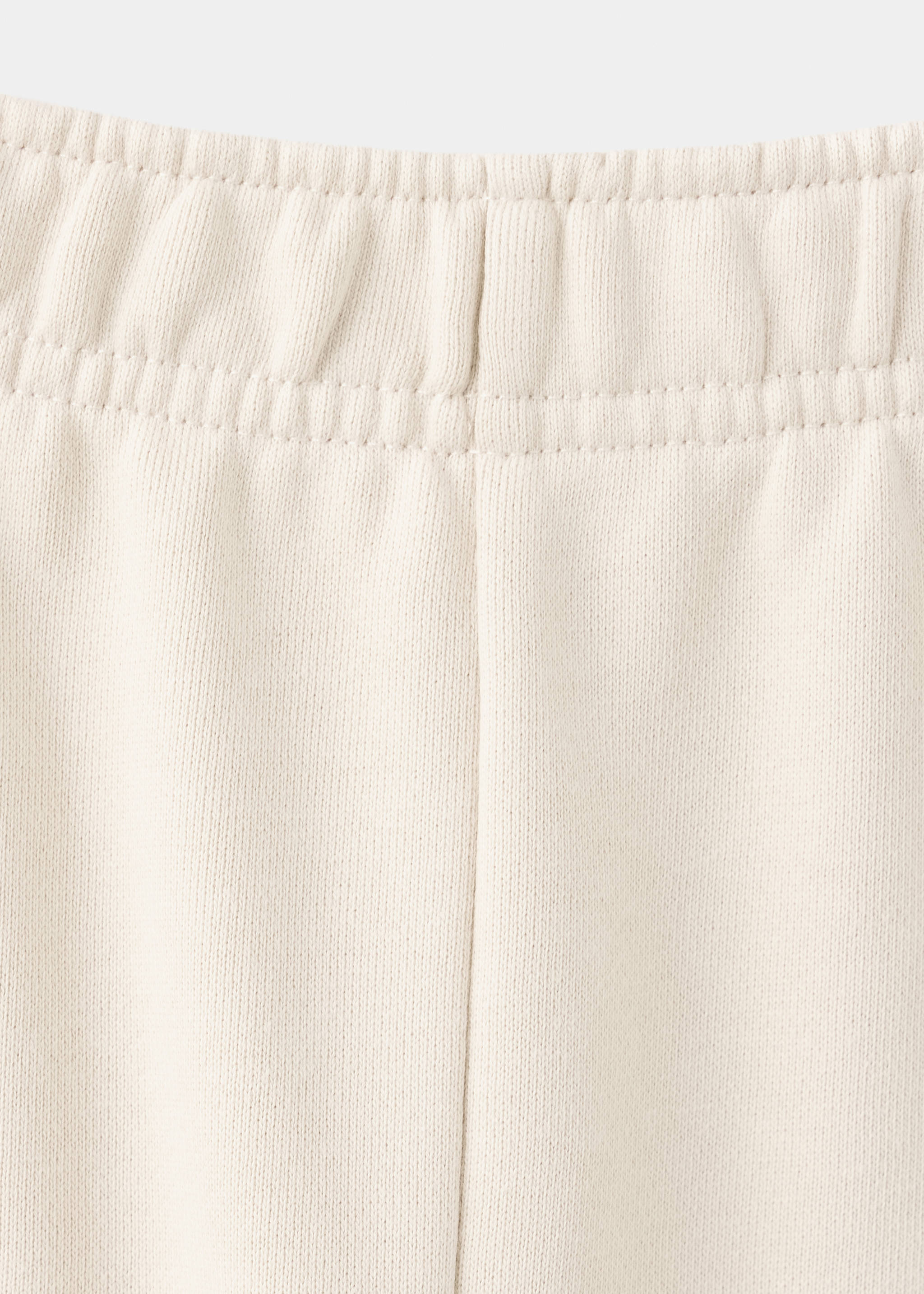 Pantalon jogger avec fleur brodée - Détail de l'article 0