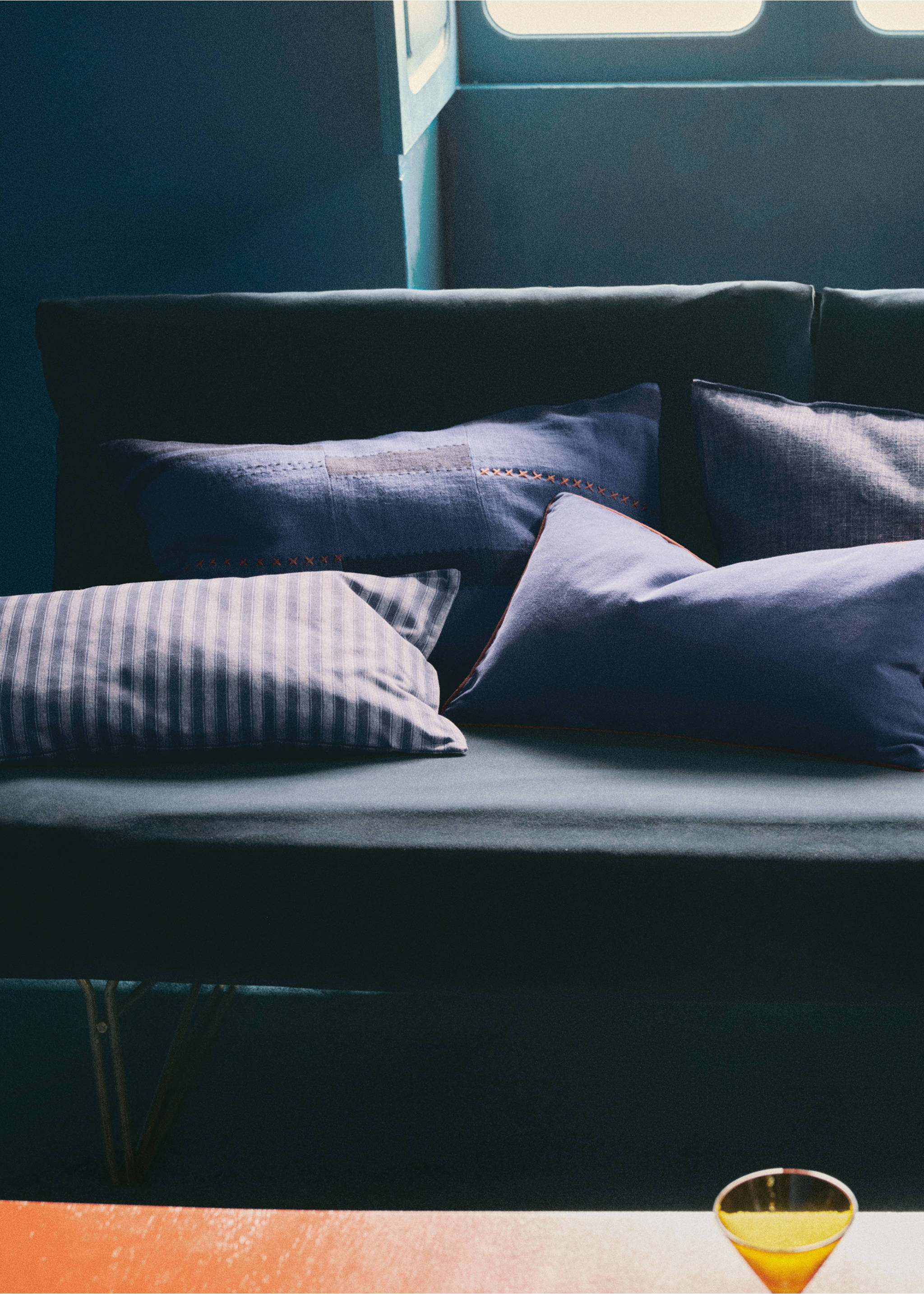 Dark blue cushion cover with contrast stitching on a sofa., Dark Blue. Ref: 37004443-00.