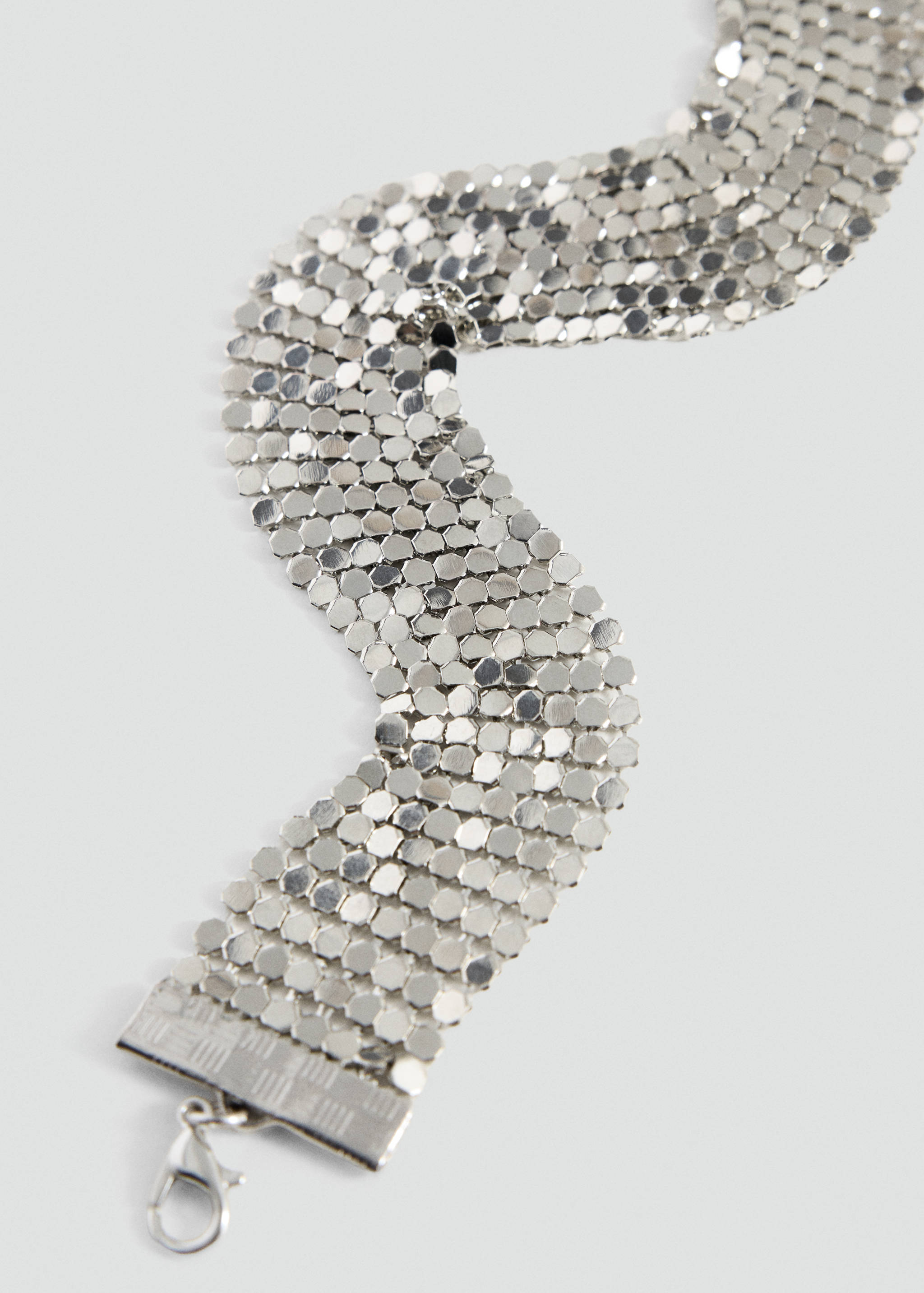 Silver metallic sequin mesh collar necklace with a metal clasp.