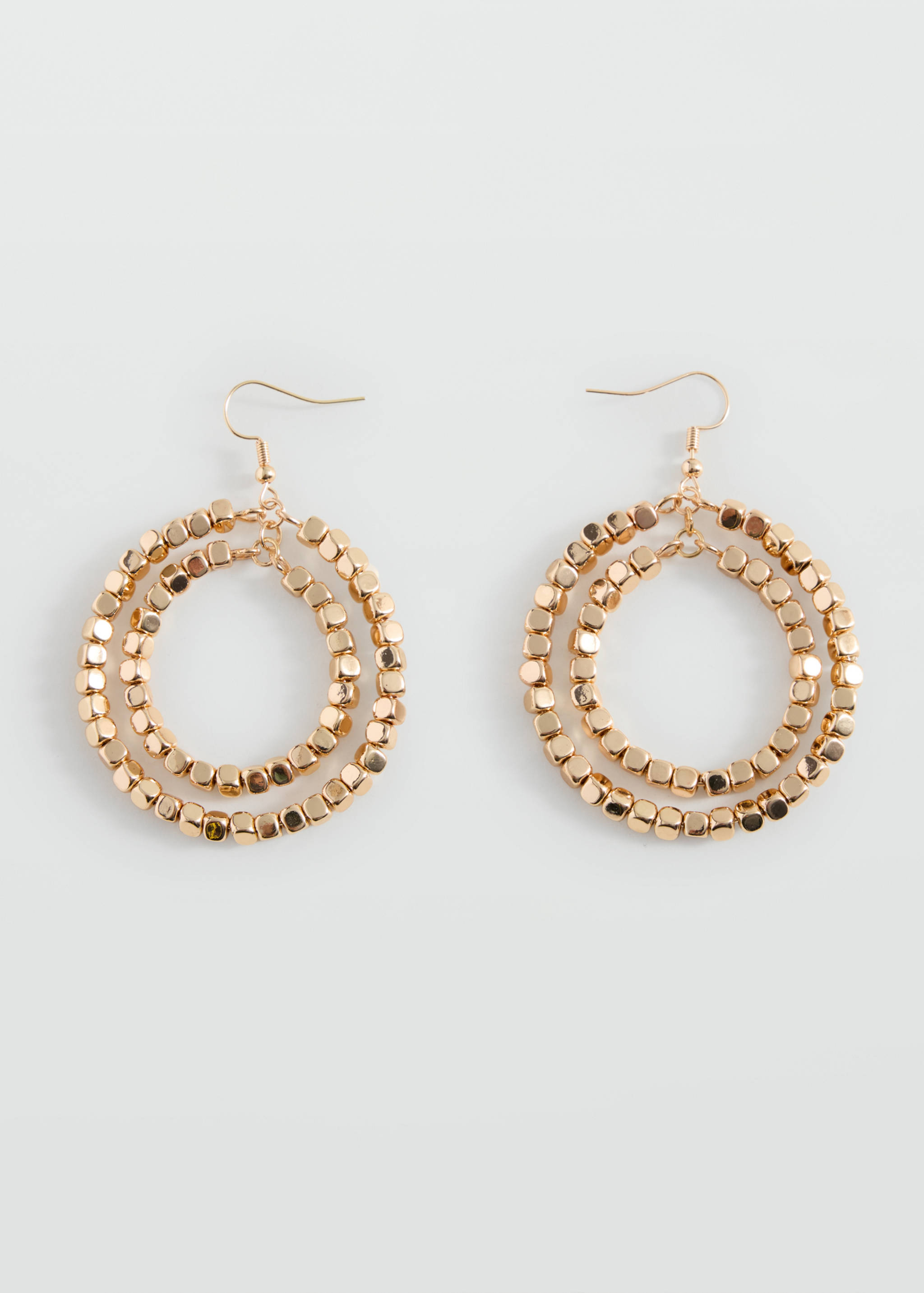 Gold-coloured drop earrings with double concentric hoops made of small cube beads.