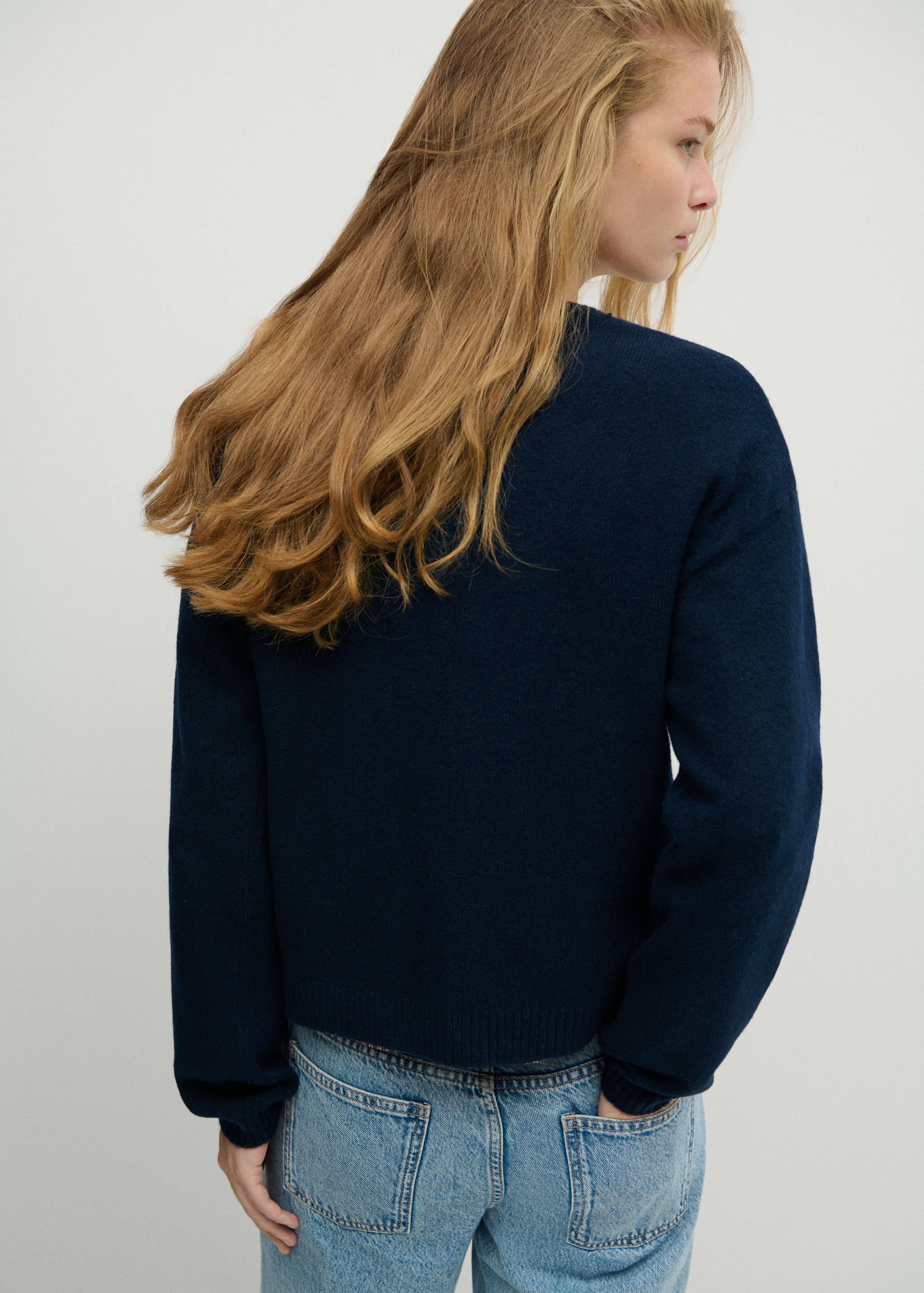 Ribbed neck sweater - Reverse of the article