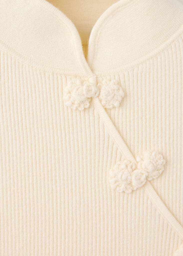 Ribbed knitted jumper with frog closures — Ecru