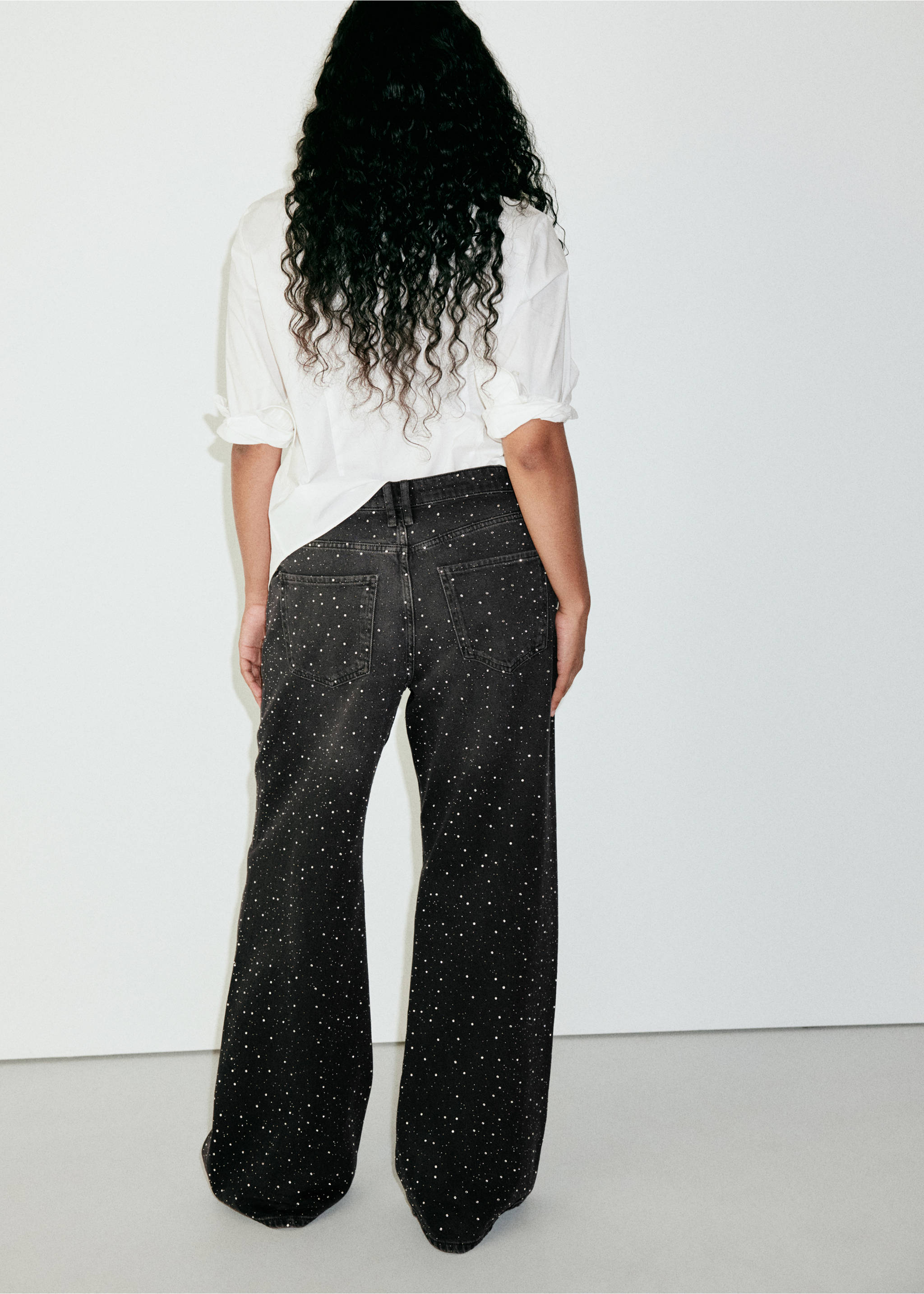 Wide leg jeans with rhinestones - Details of the article 4, Black denim. Ref: 37005898-00.