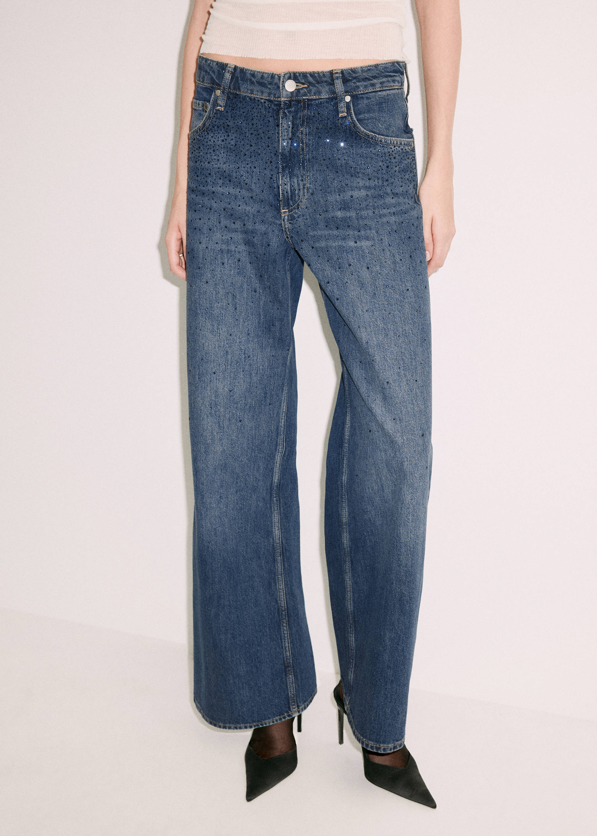 Mid-blue rhinestone-embellished denim trousers in a straight-leg fit.
