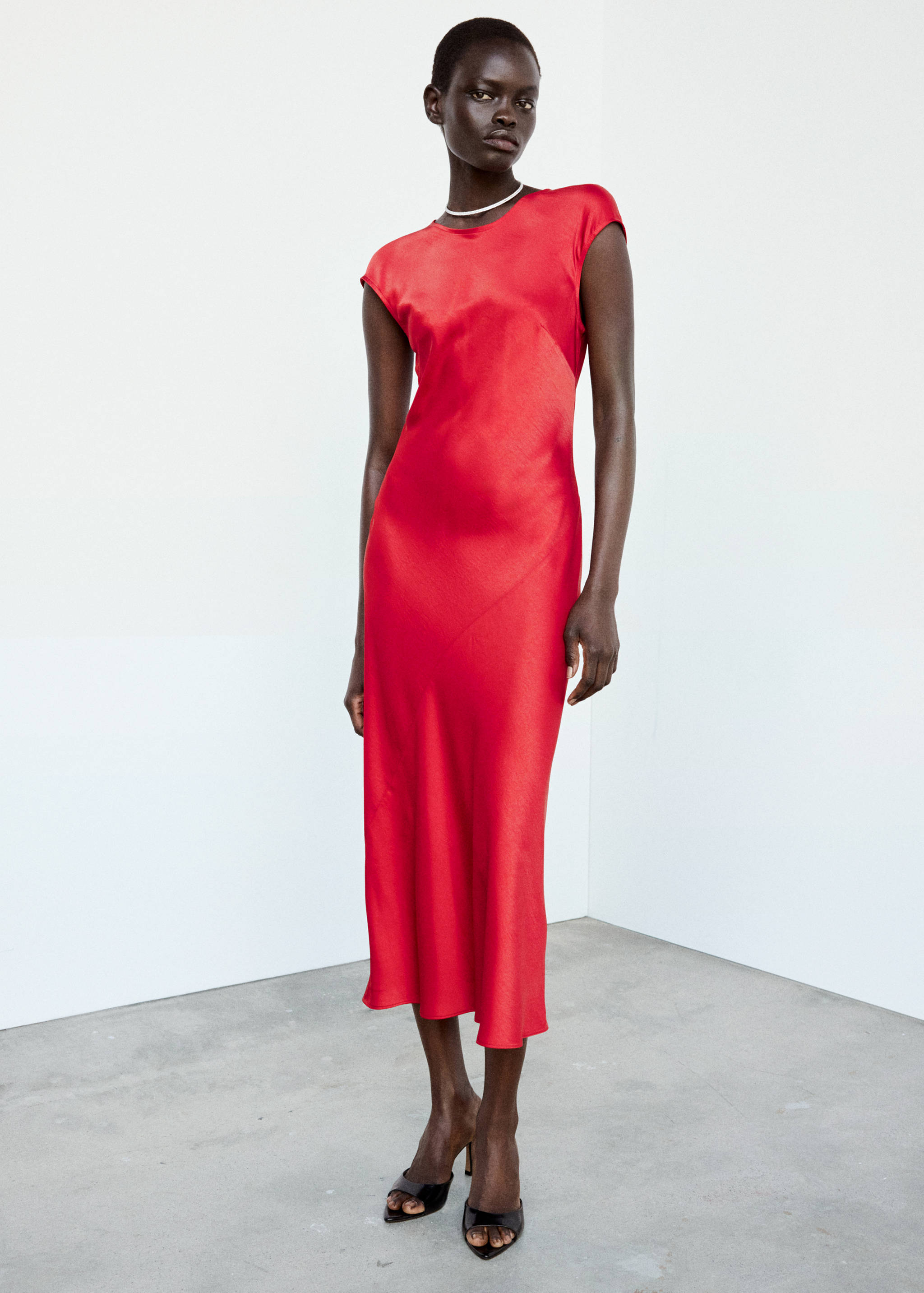 Bright red sleeveless satin midi dress with round neckline.