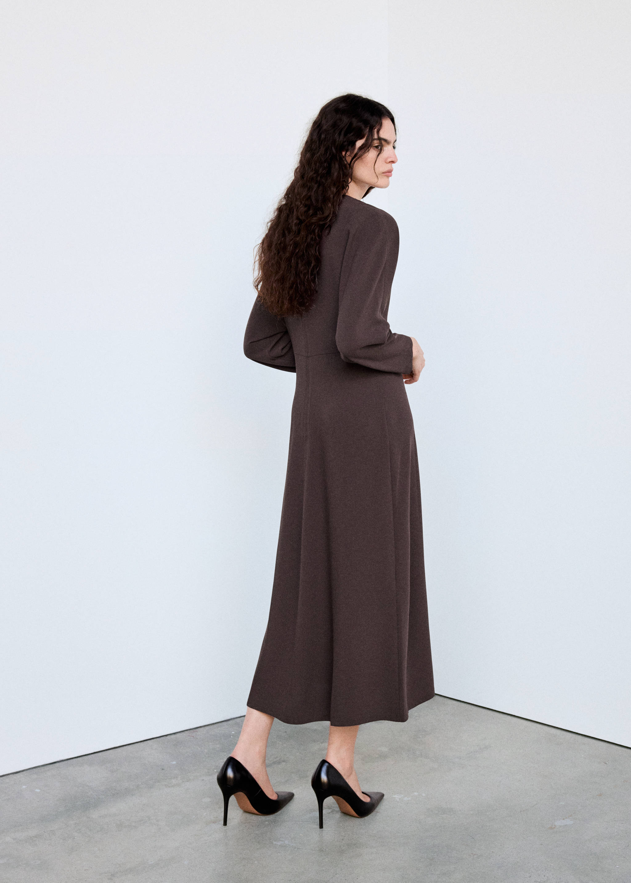 Long-sleeve dress with cut-outs - Reverse of the article