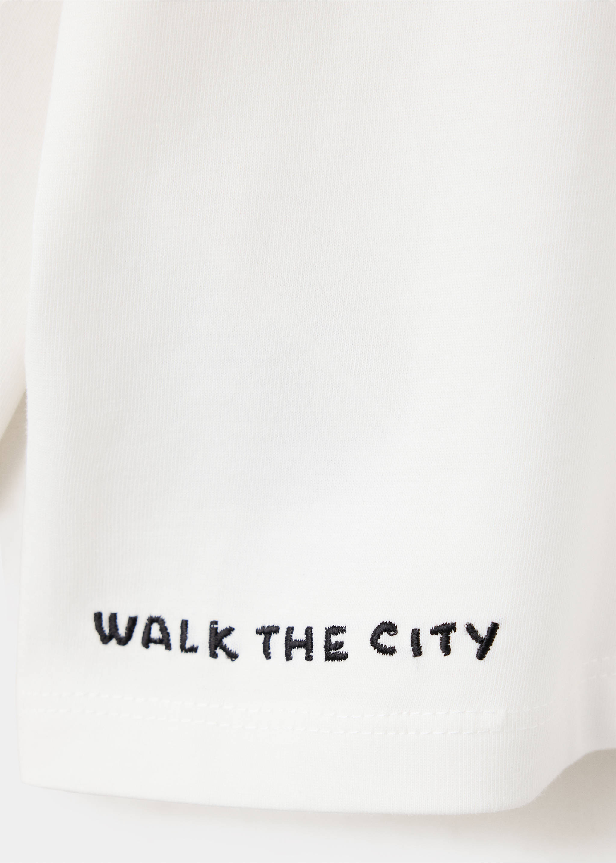 White kids' t-shirt fabric detail with black embroidered text., Off White. Ref: 37006335-00.