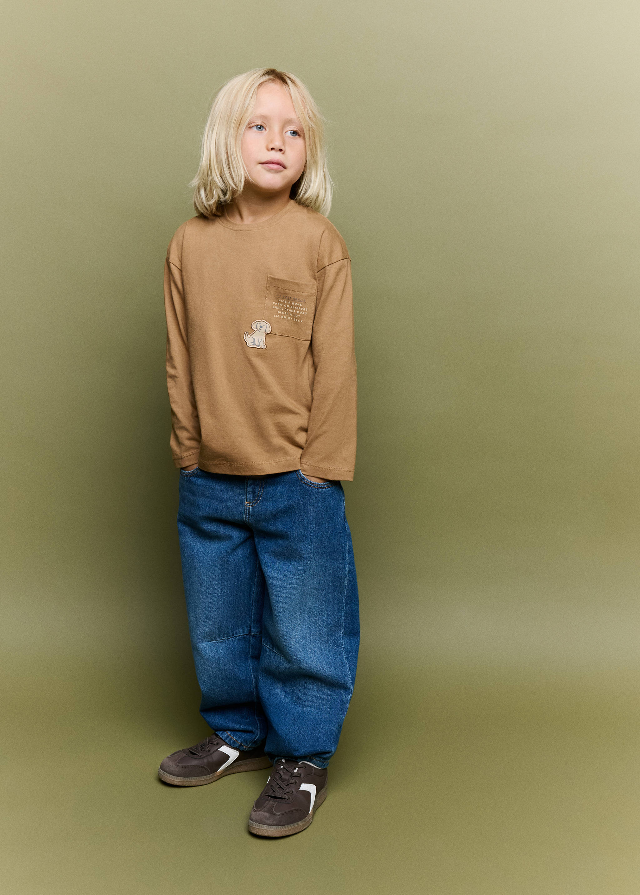 Brown long-sleeved t-shirt with a chest pocket and embroidered dog patch