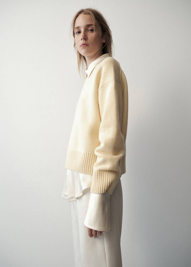 Rounded neck wool sweater — Pastel Yellow