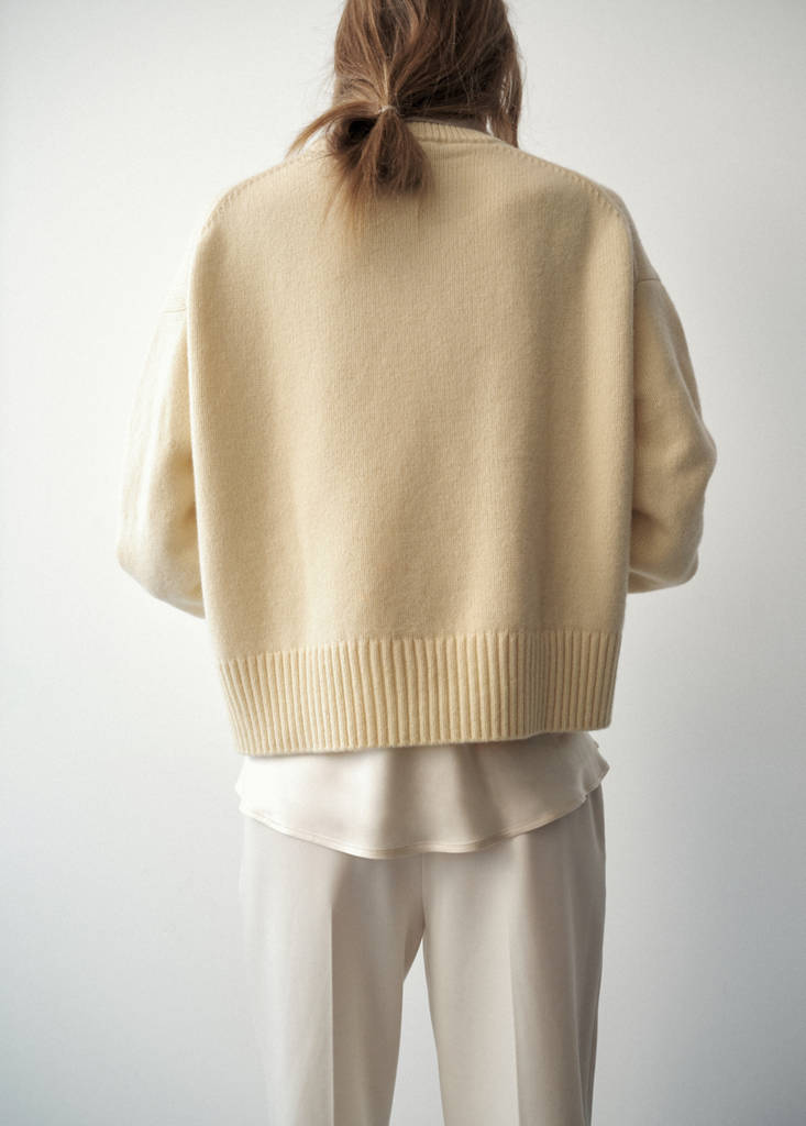 Rounded neck wool sweater — Pastel Yellow