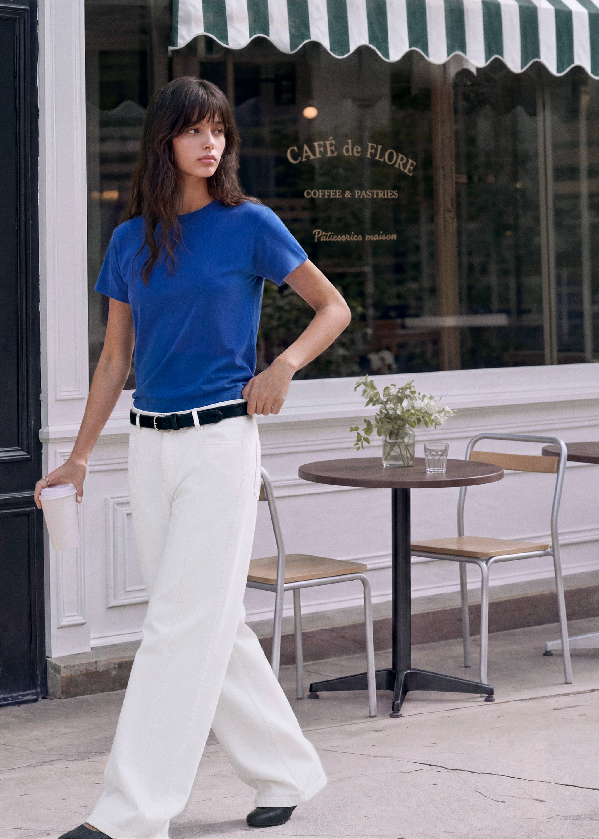 White denim trousers styled with a royal blue t-shirt and a black belt., Off White. Ref: 37006352-00.