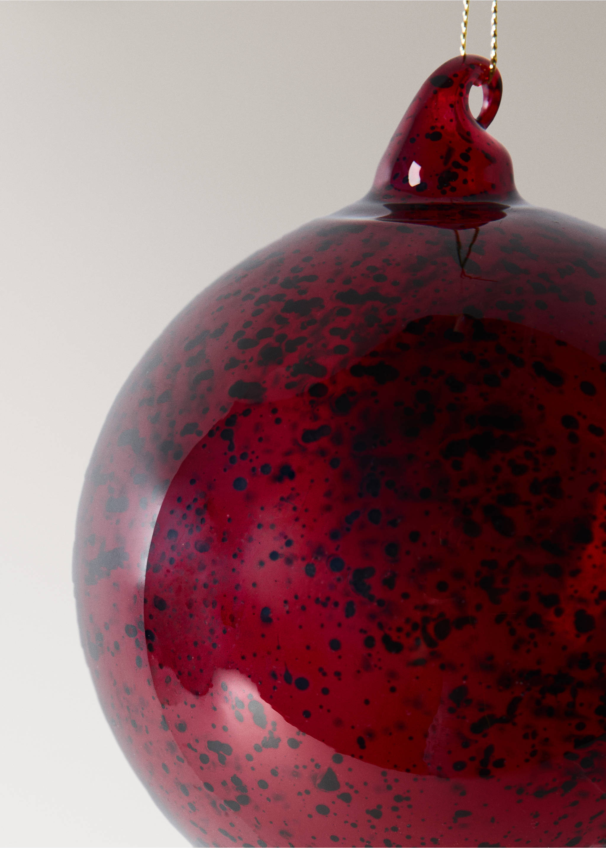 Dark red speckled glass Christmas ornament with a hanging loop., Red. Ref: 37006745-00.