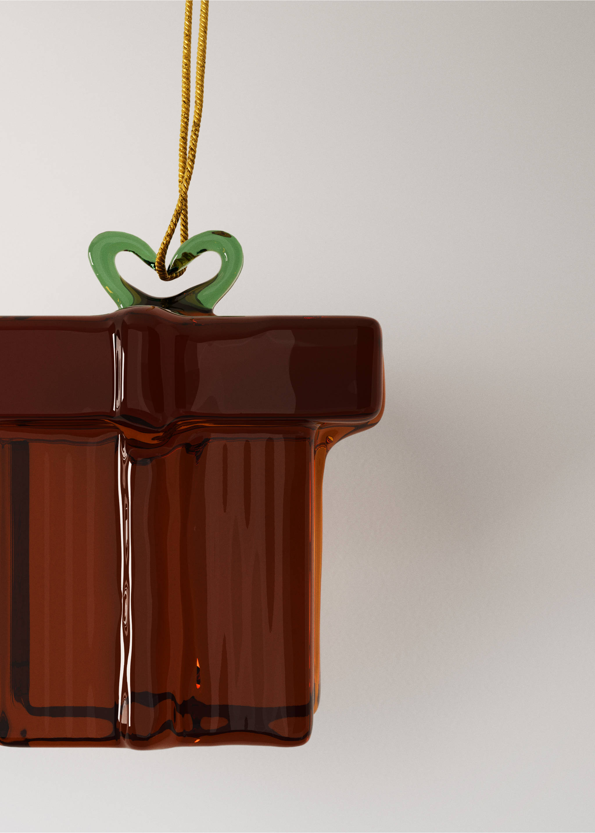 Two amber-brown glass Christmas ornaments shaped like wrapped gifts with green bows., Red. Ref: 37006746-00.