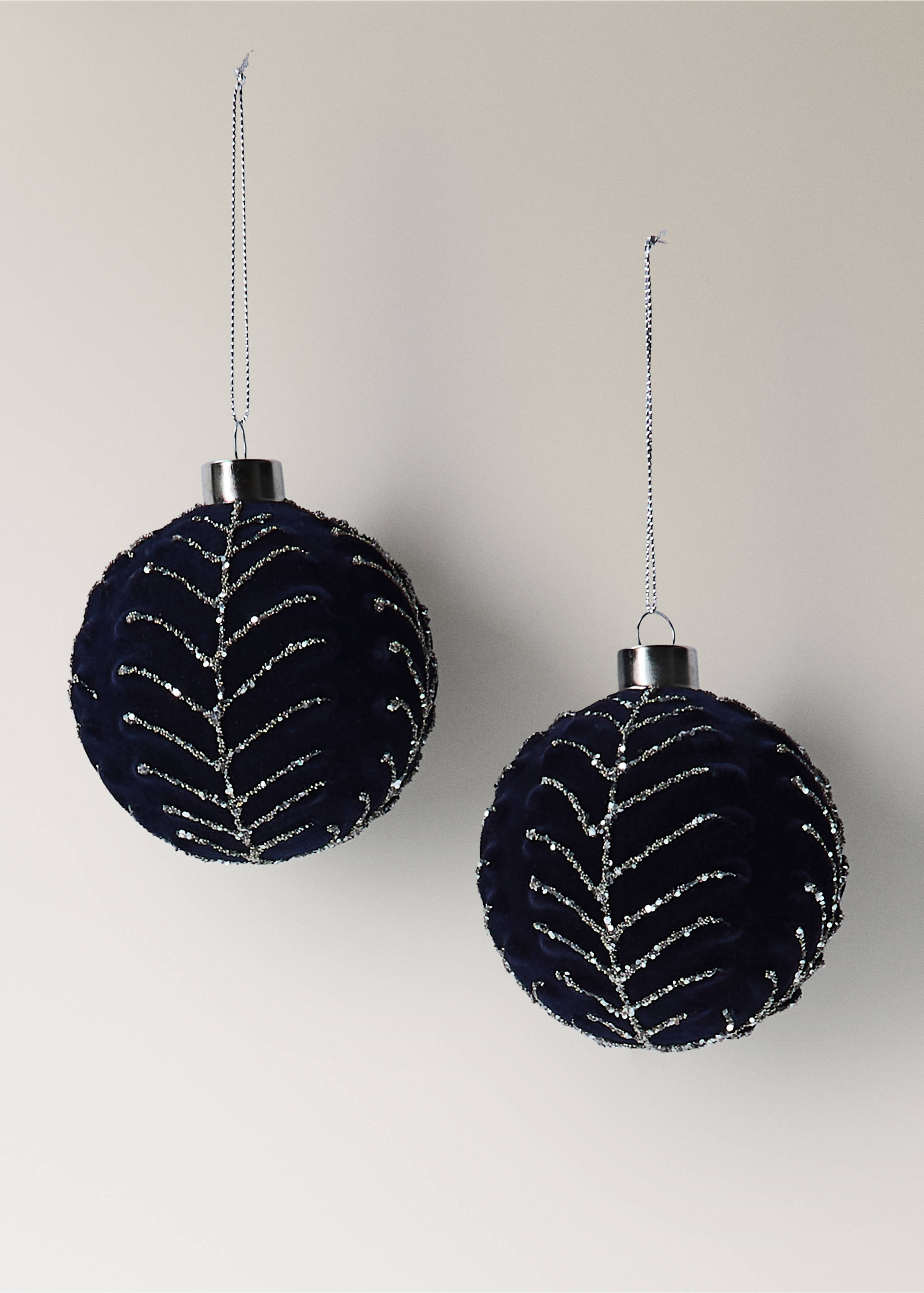 Dark blue velvet Christmas baubles with beaded silver leaf patterns and silver hanging caps., Blue. Ref: 37006747-00.