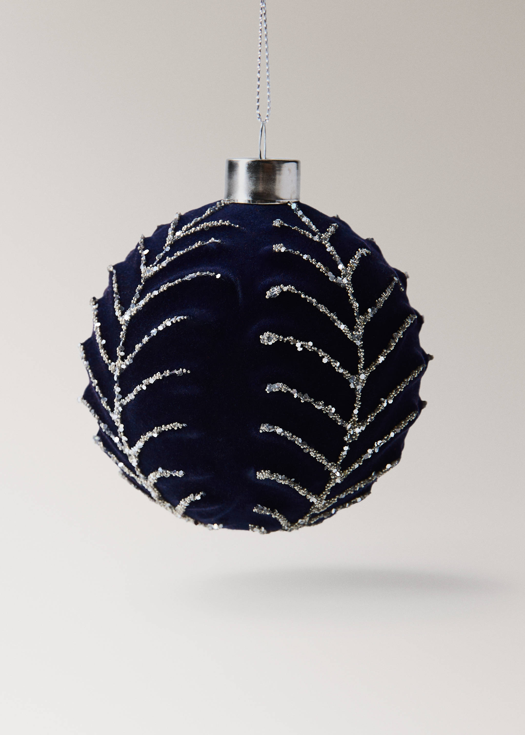 Dark navy velvet Christmas ornament with silver beaded leaf embroidery.