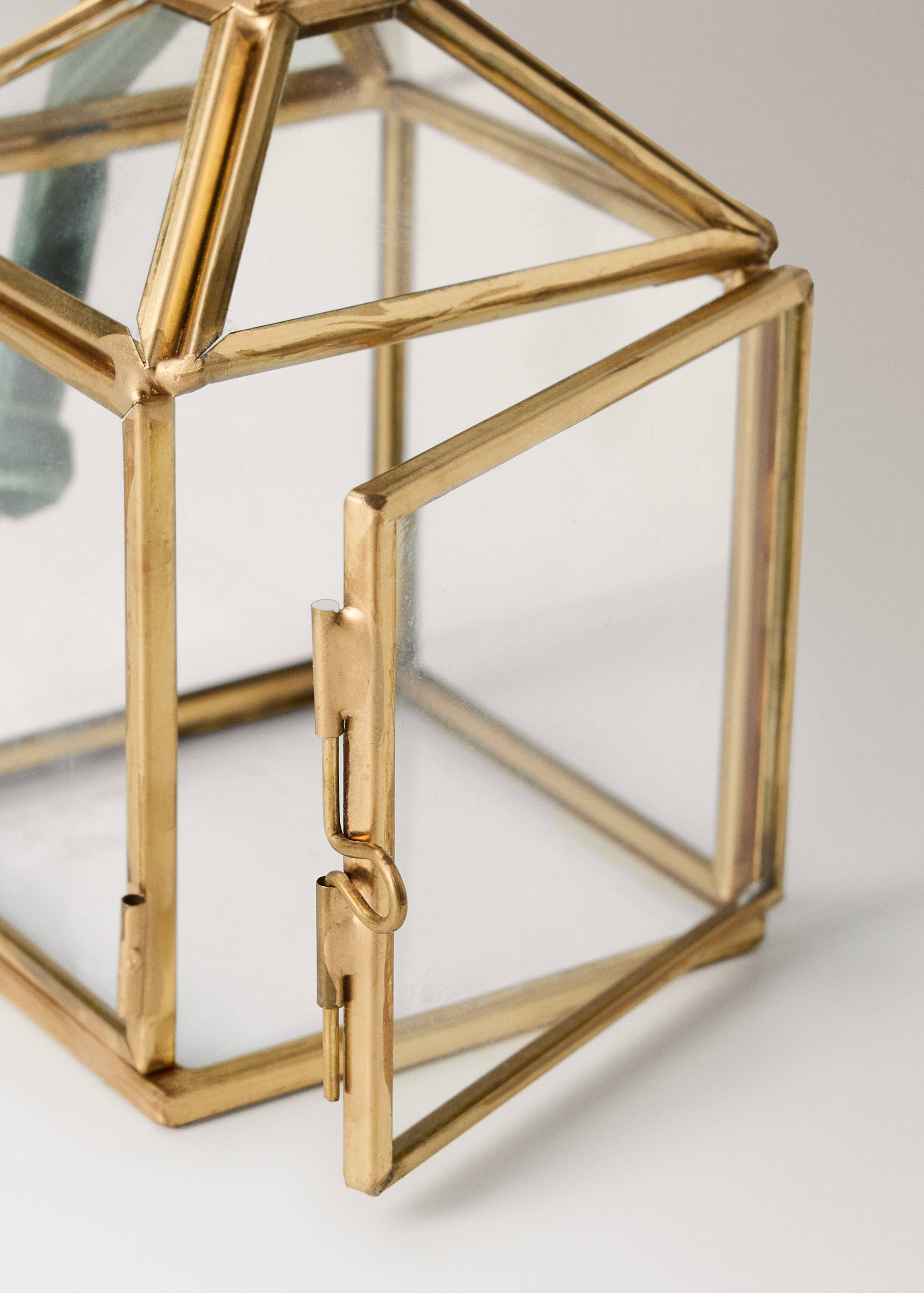 Gold-framed glass Christmas ornament lantern with a hinged door.