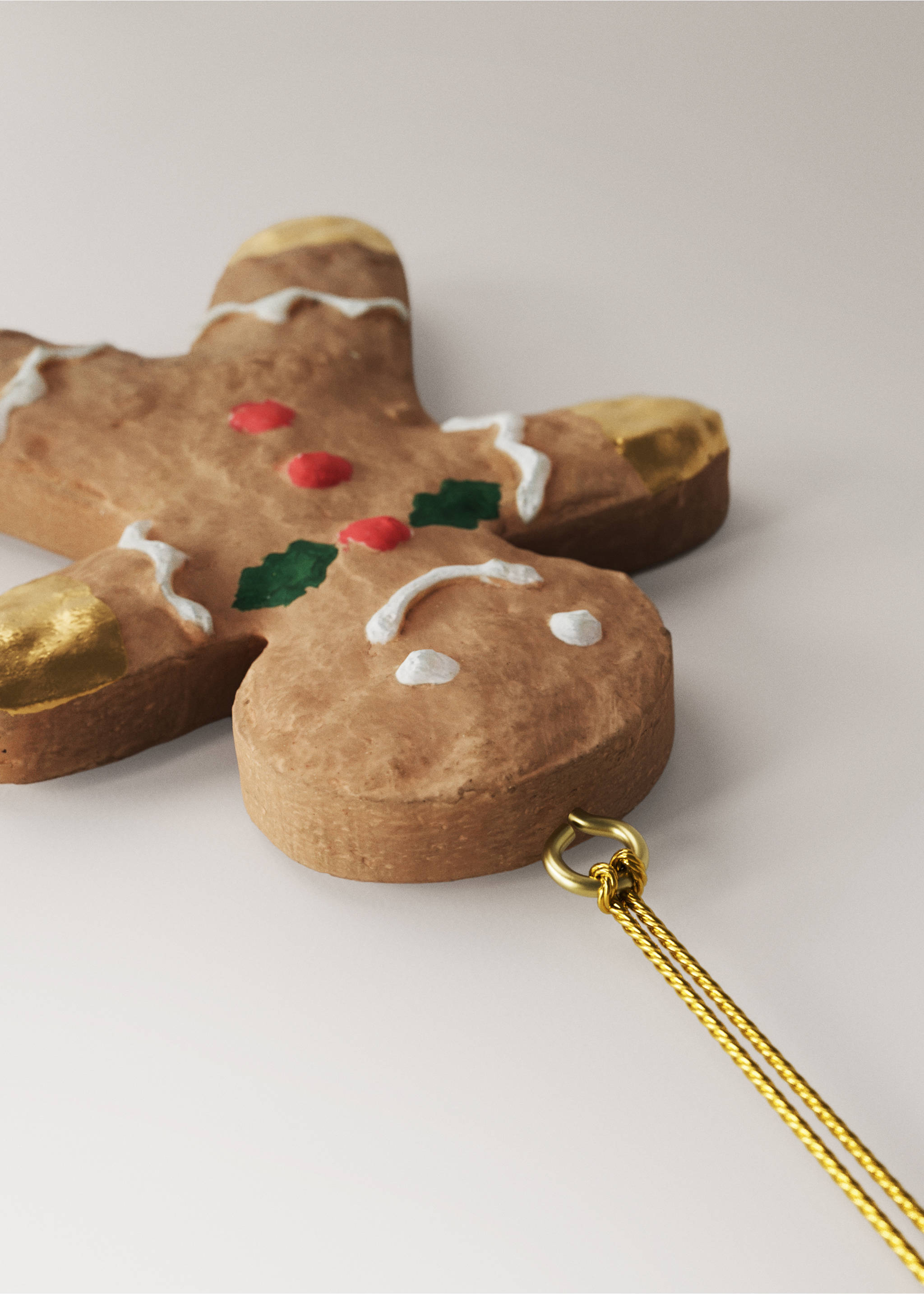 Set of four textured paper-mâché Christmas tree ornaments including cakes, a gingerbread man, and a mug., Brown. Ref: 37006766-00.