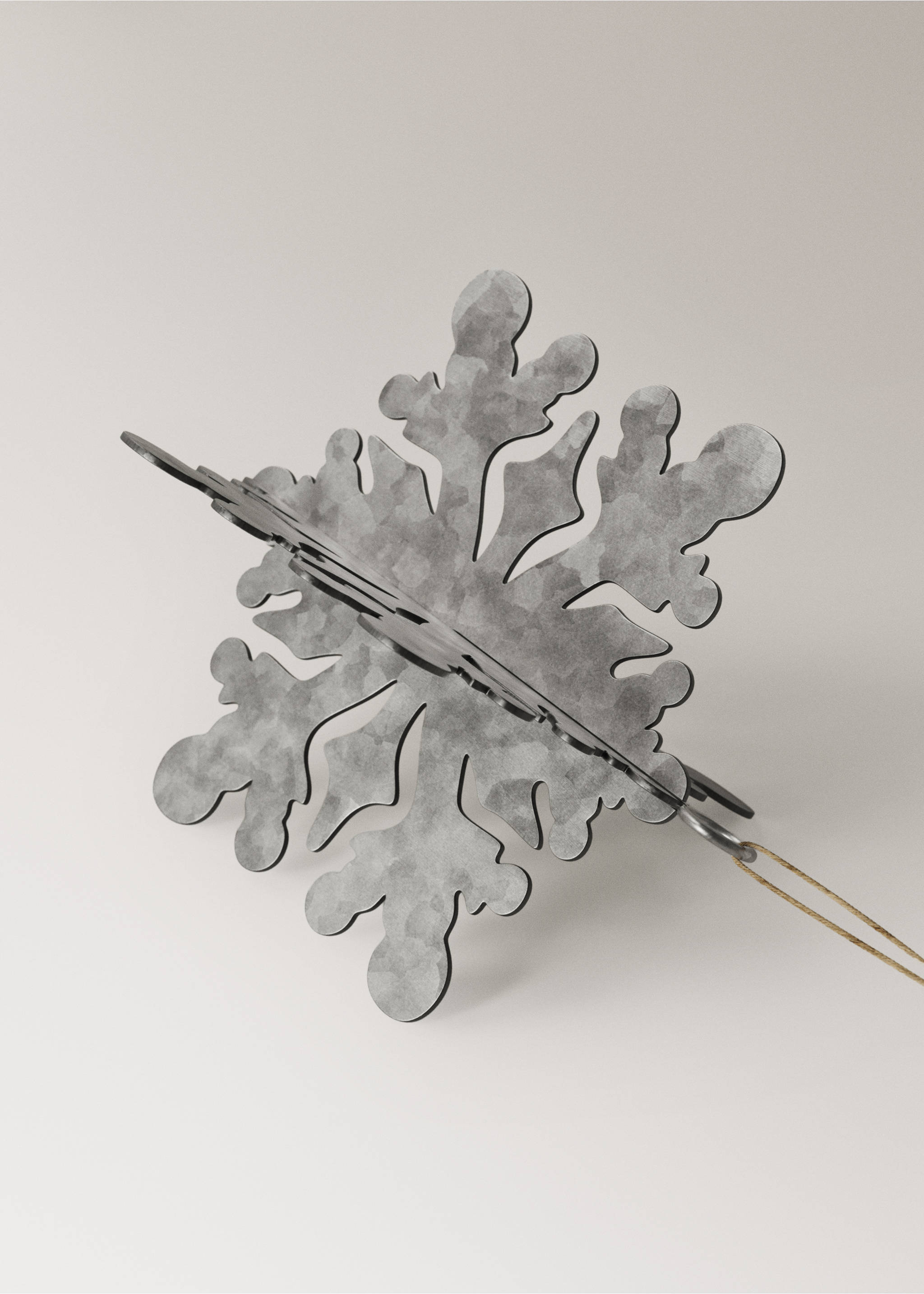Grey metallic snowflake Christmas ornament with a textured galvanized finish and hanging twine., Silver. Ref: 37006782-00.