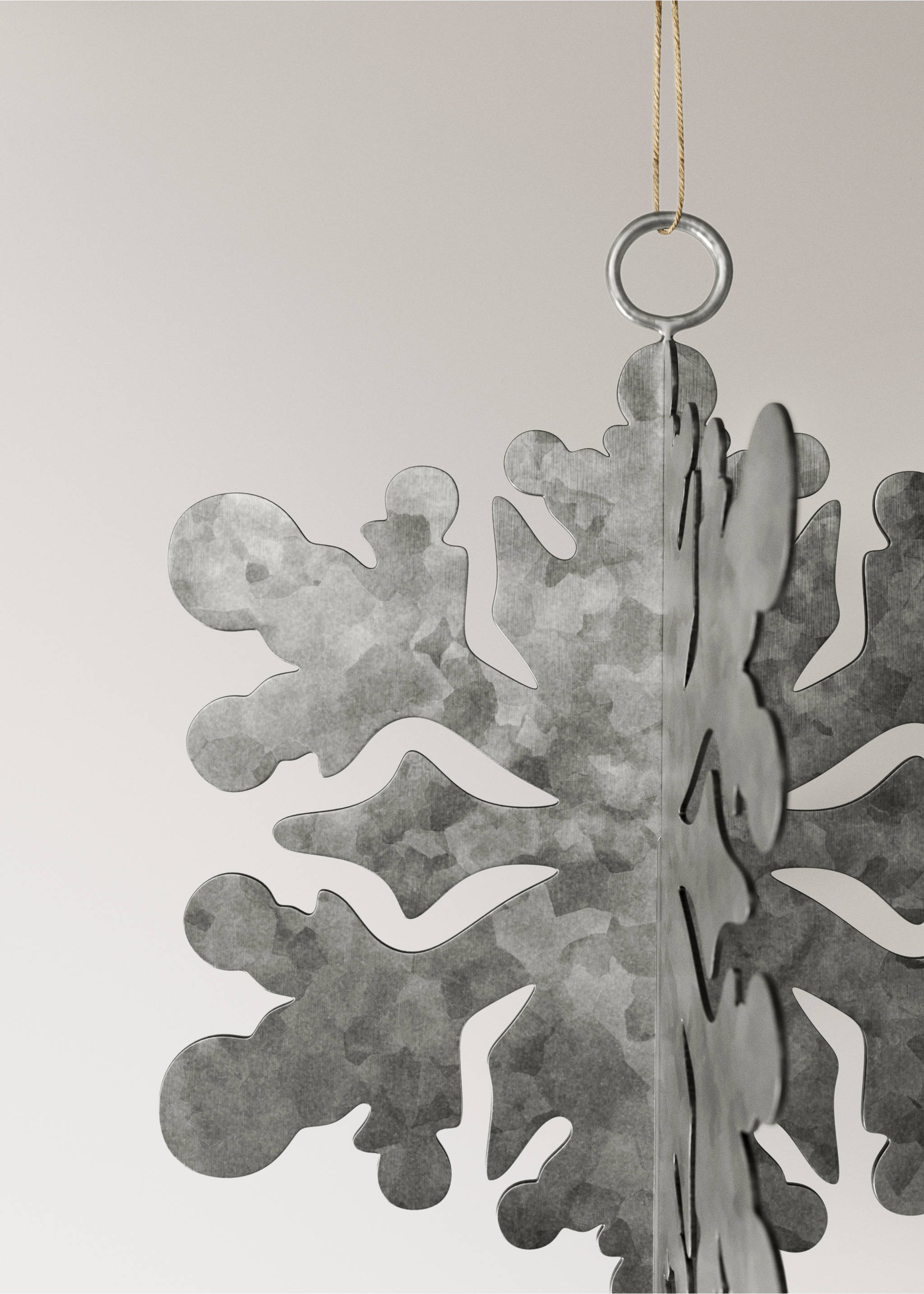Grey metal snowflake Christmas ornament with a textured finish and hanging loop., Silver. Ref: 37006782-00.