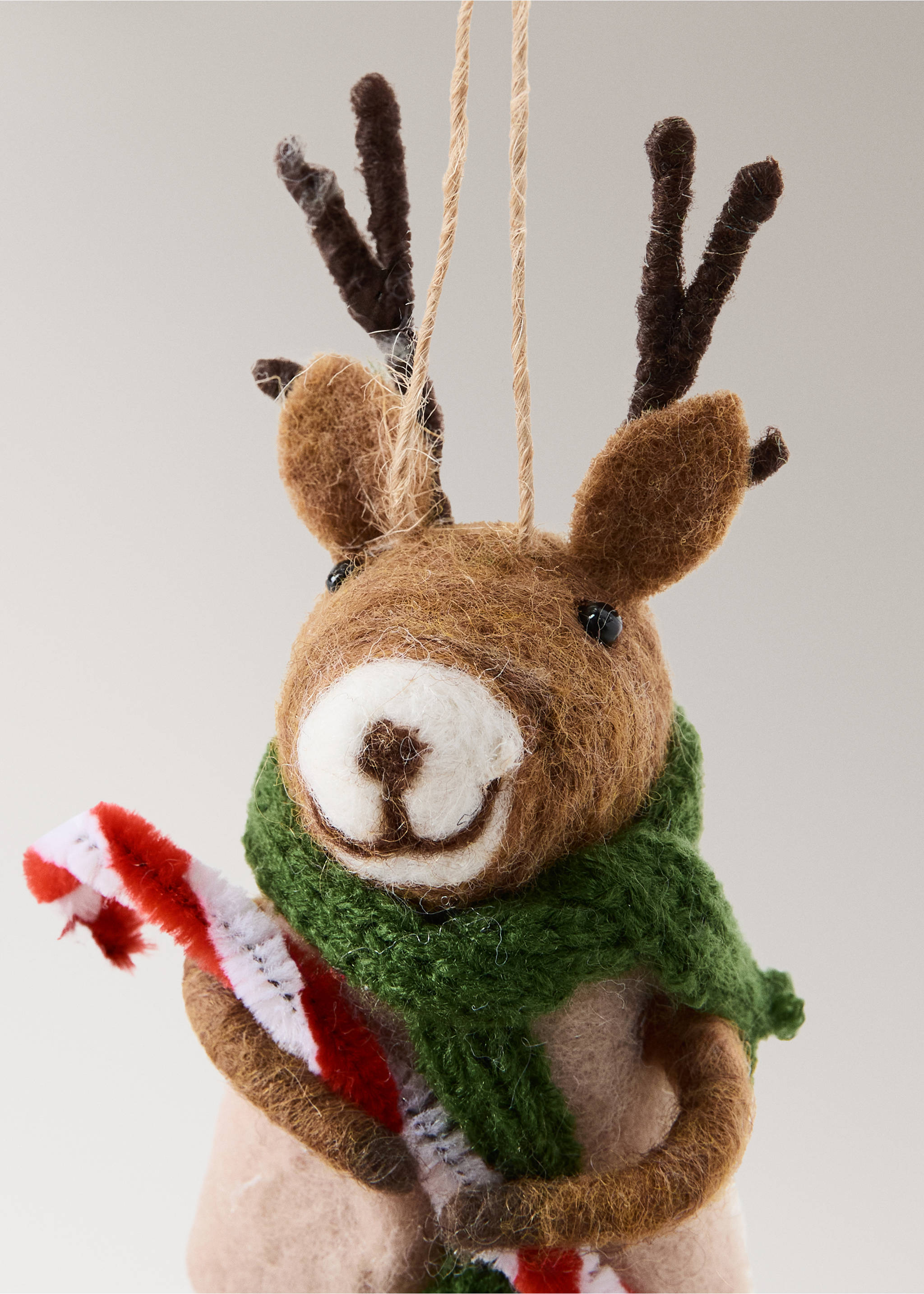 Felt reindeer Christmas ornament with a green scarf and candy cane., Green. Ref: 37006791-00.