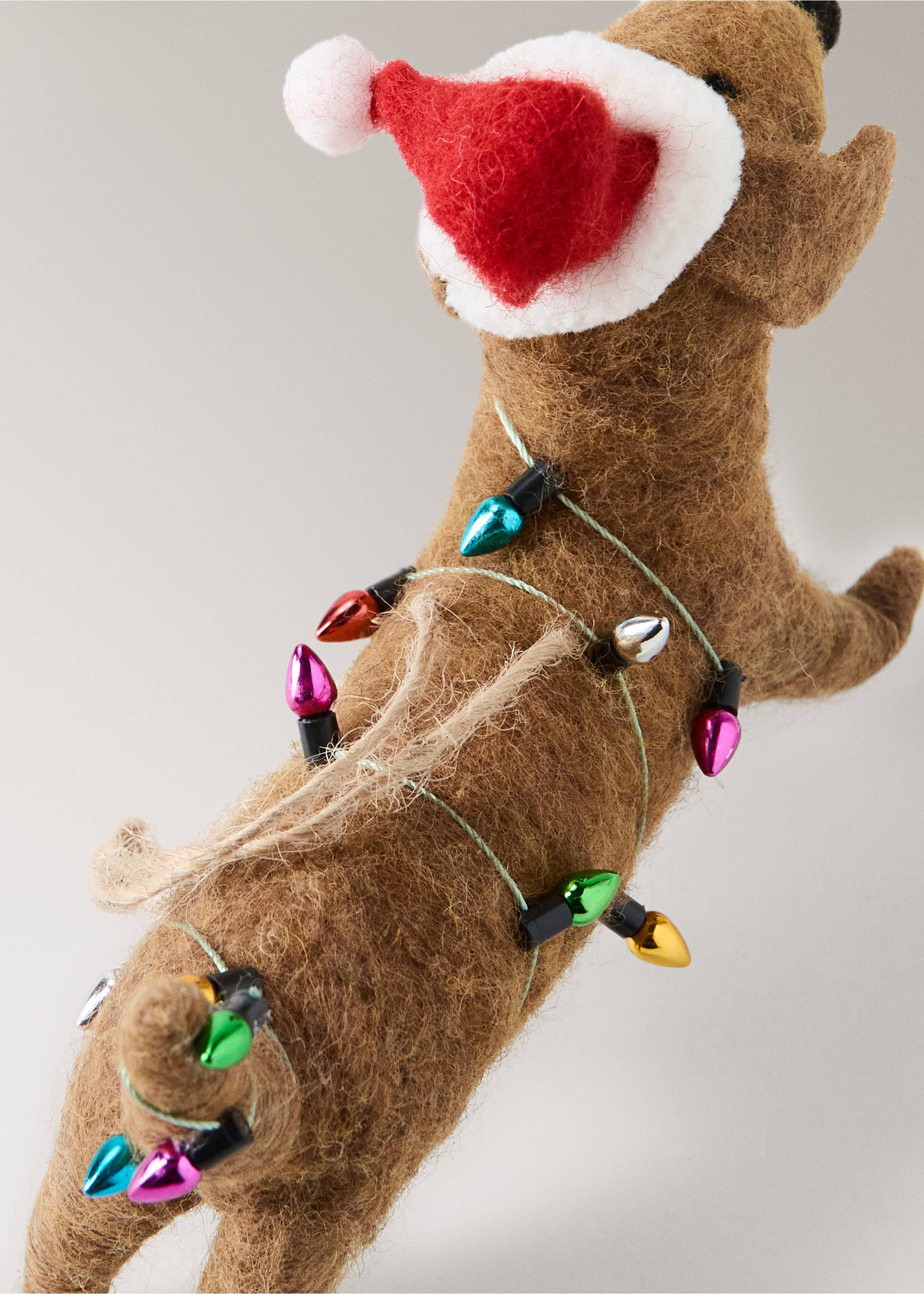 Brown felt dachshund Christmas ornament wearing a Santa hat and colourful string lights., Brown. Ref: 37006793-00.