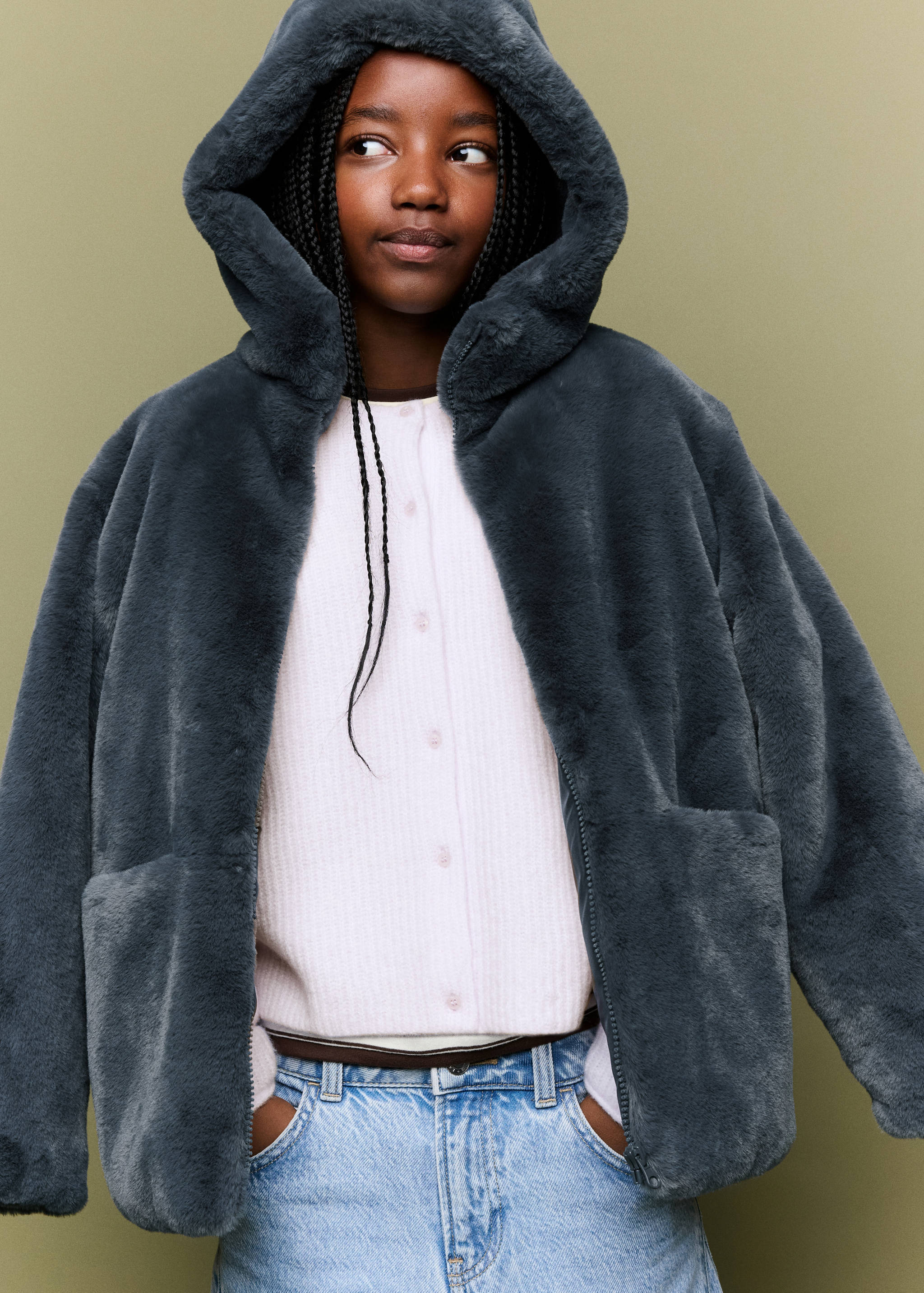 Dark grey faux-fur hooded coat with front zip and patch pockets.