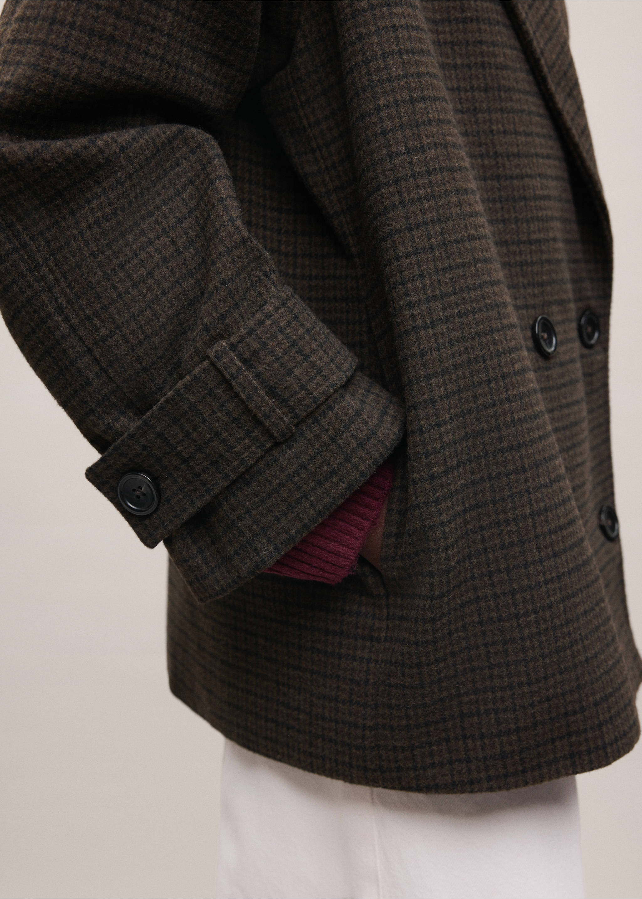 Close-up of a brown houndstooth coat with double-breasted buttons and cuff tabs., Chocolate. Ref: 37007121-01.