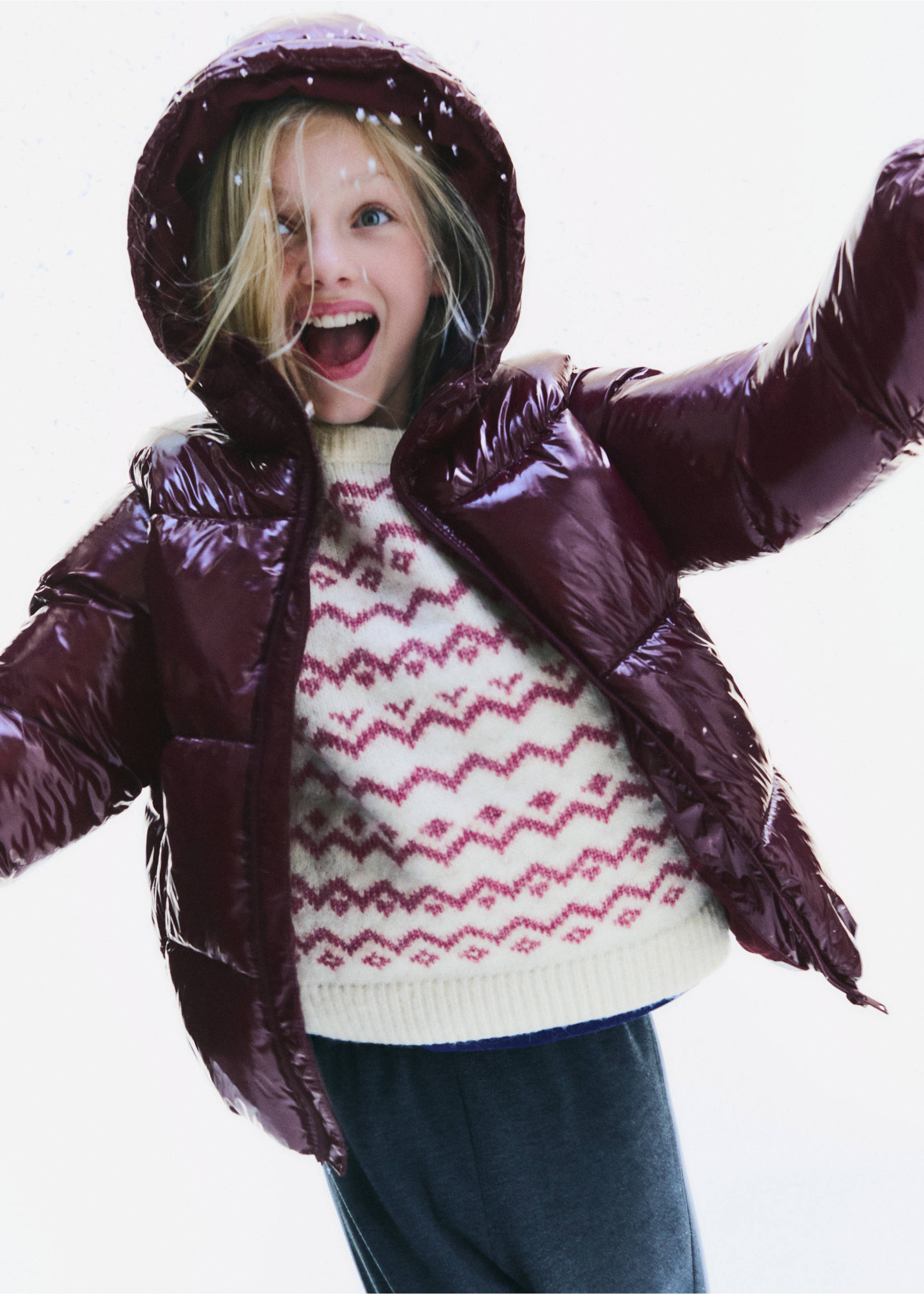 White jersey featuring a pink fair isle zigzag pattern, worn under a glossy burgundy puffer jacket., Pink. Ref: 37007127-00.
