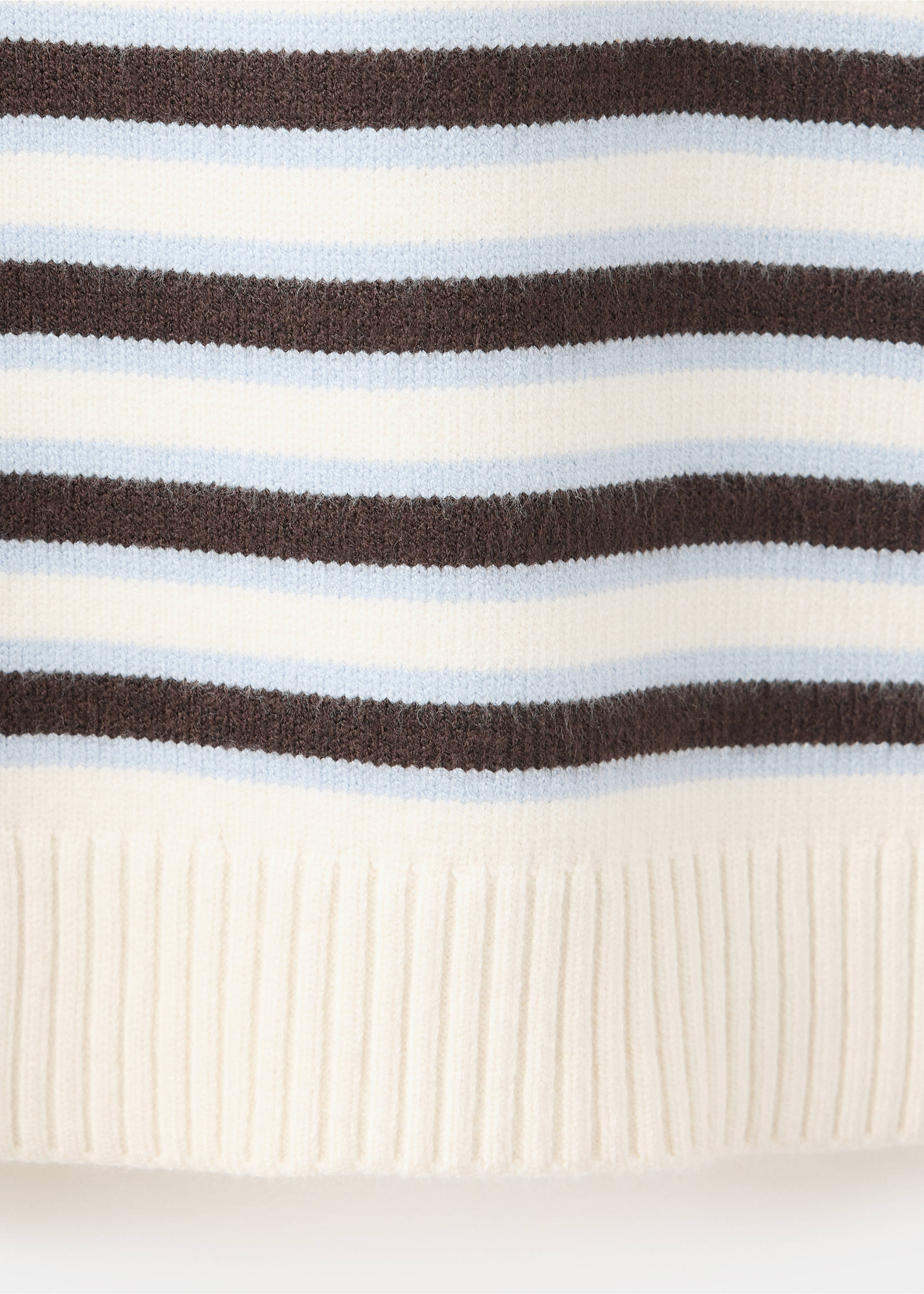 Close-up of a striped knit jersey with a ribbed hem., Chocolate. Ref: 37007784-00.