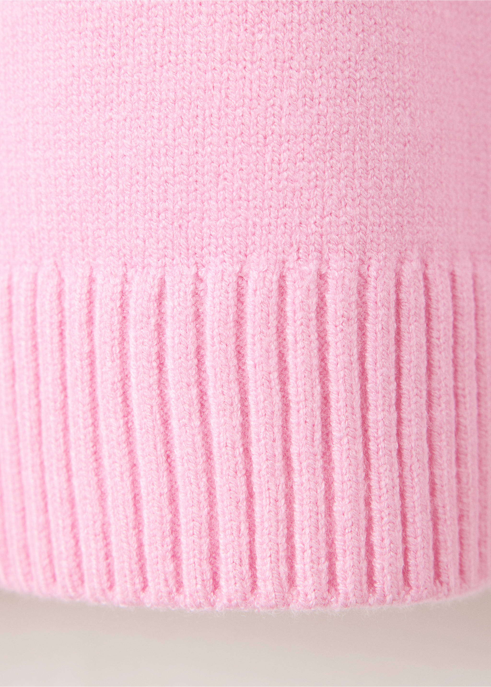 Close-up of pink jersey fabric showing fine knit and ribbed hem., Light Pink. Ref: 37007784-00.