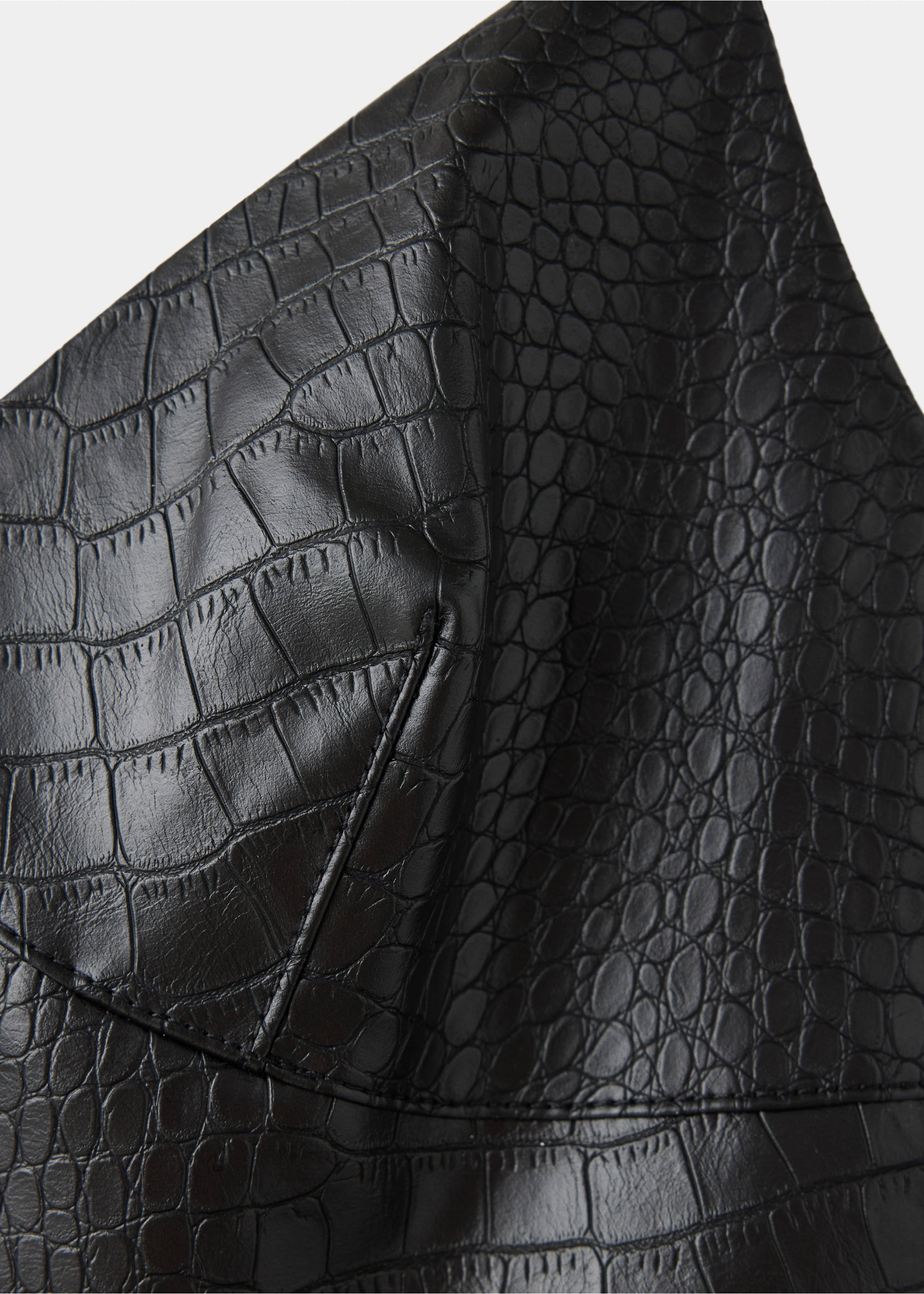 Close-up of a black crocodile-effect dress bust detail., Black. Ref: 37007794-00.