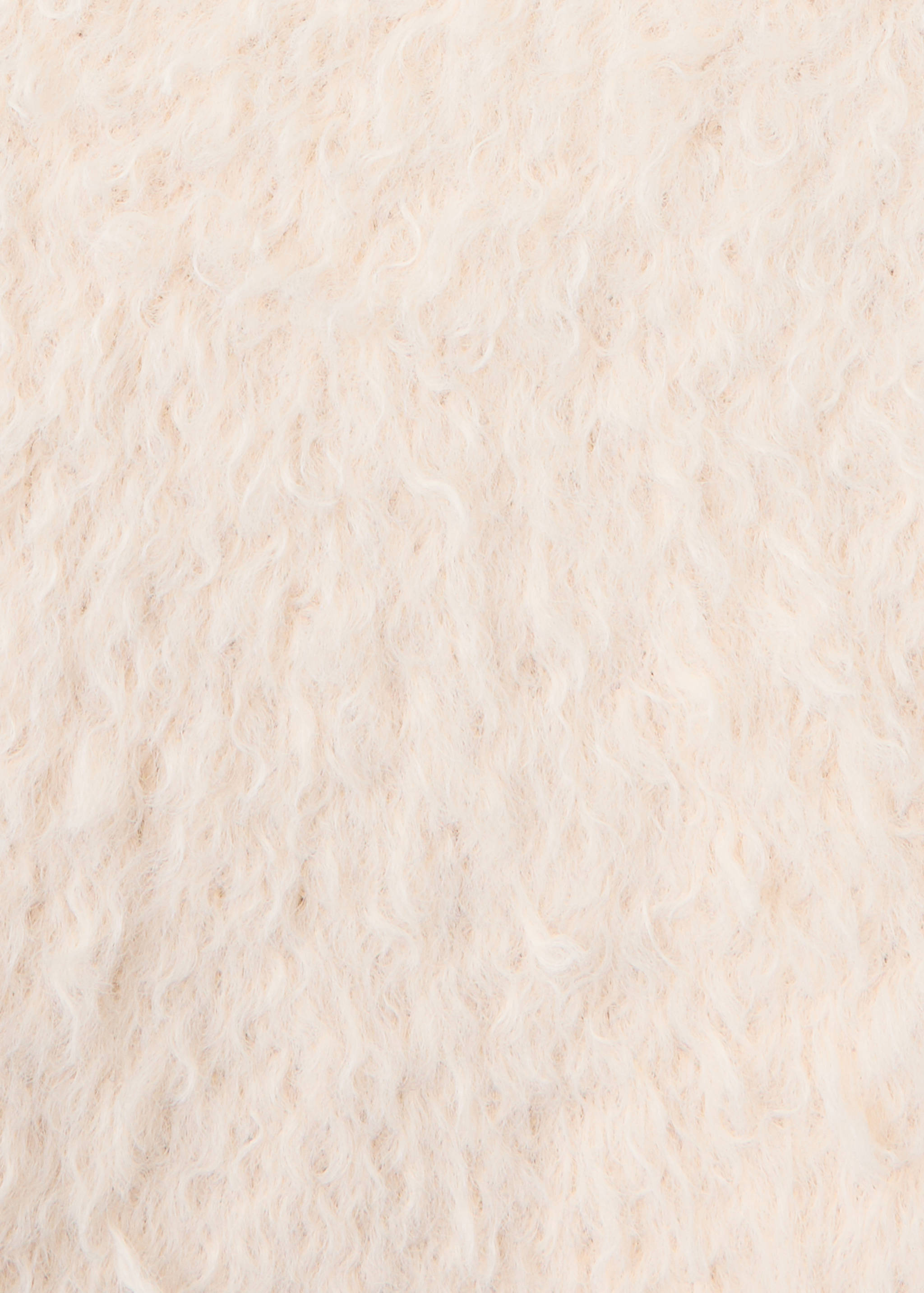 Close-up of a cream-coloured textured faux-fur jersey.