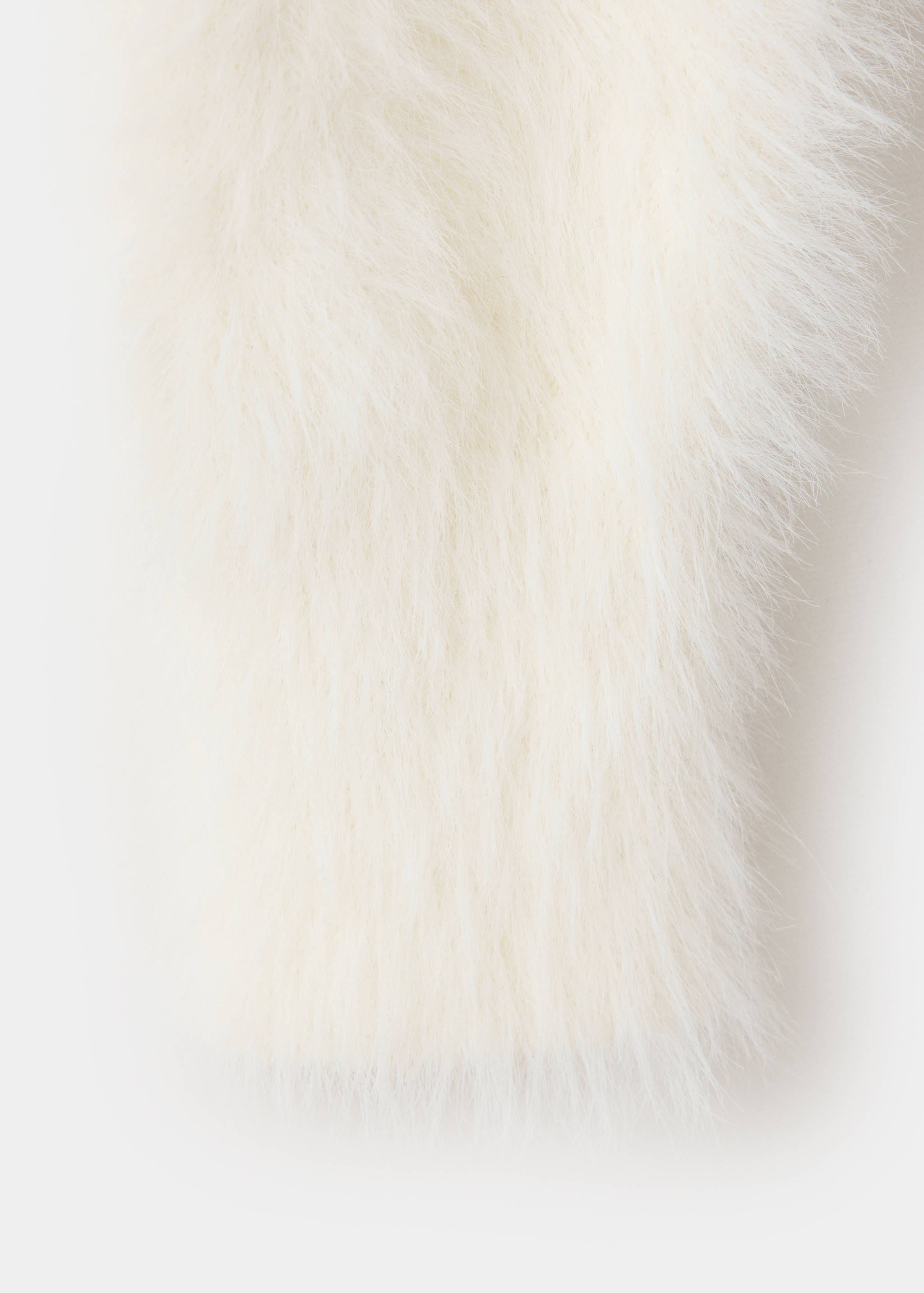 White faux-fur texture close-up of a jersey.