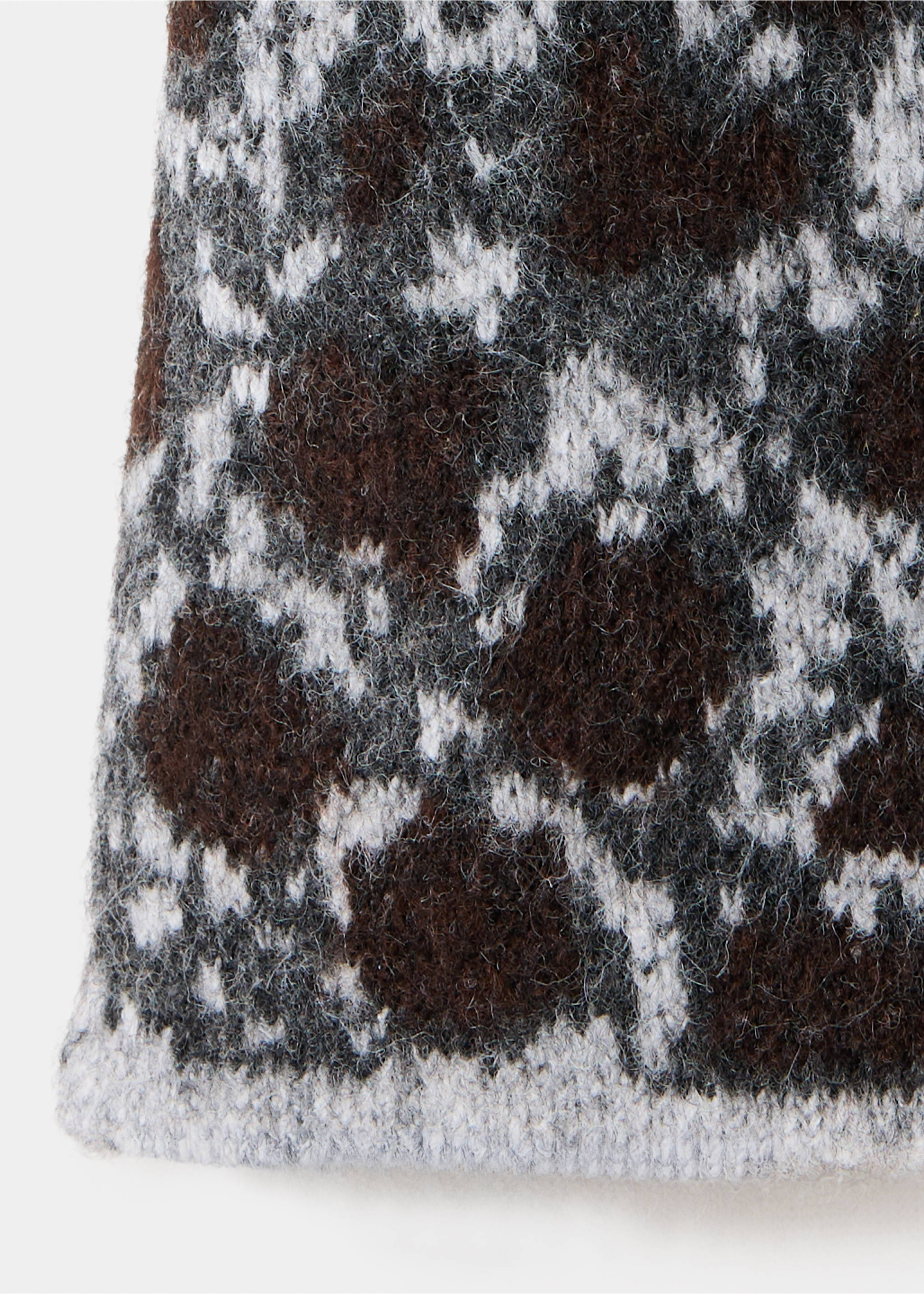 Close-up of a brown, grey, and white patterned knit sweater fabric., Medium Heather Grey. Ref: 37007803-00.