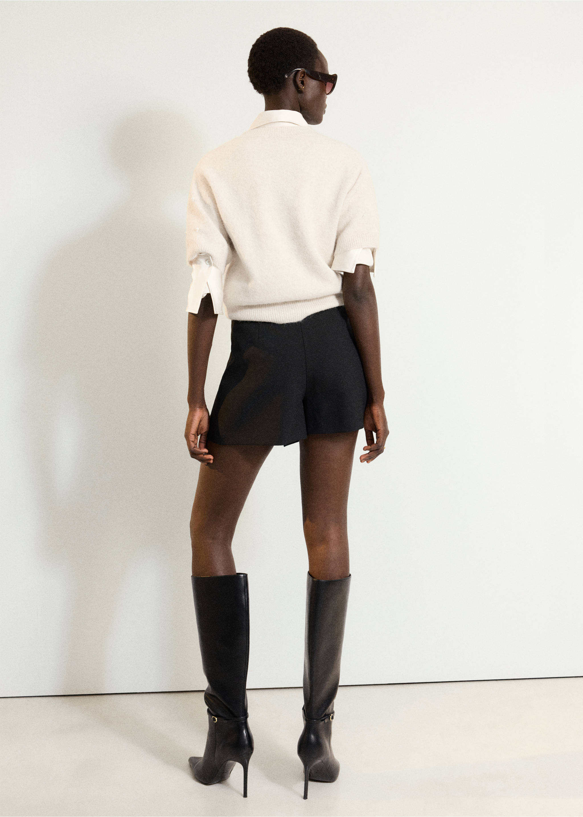 Cream knit jersey in a back view, layered over a white shirt., Ecru. Ref: 37007805-00.