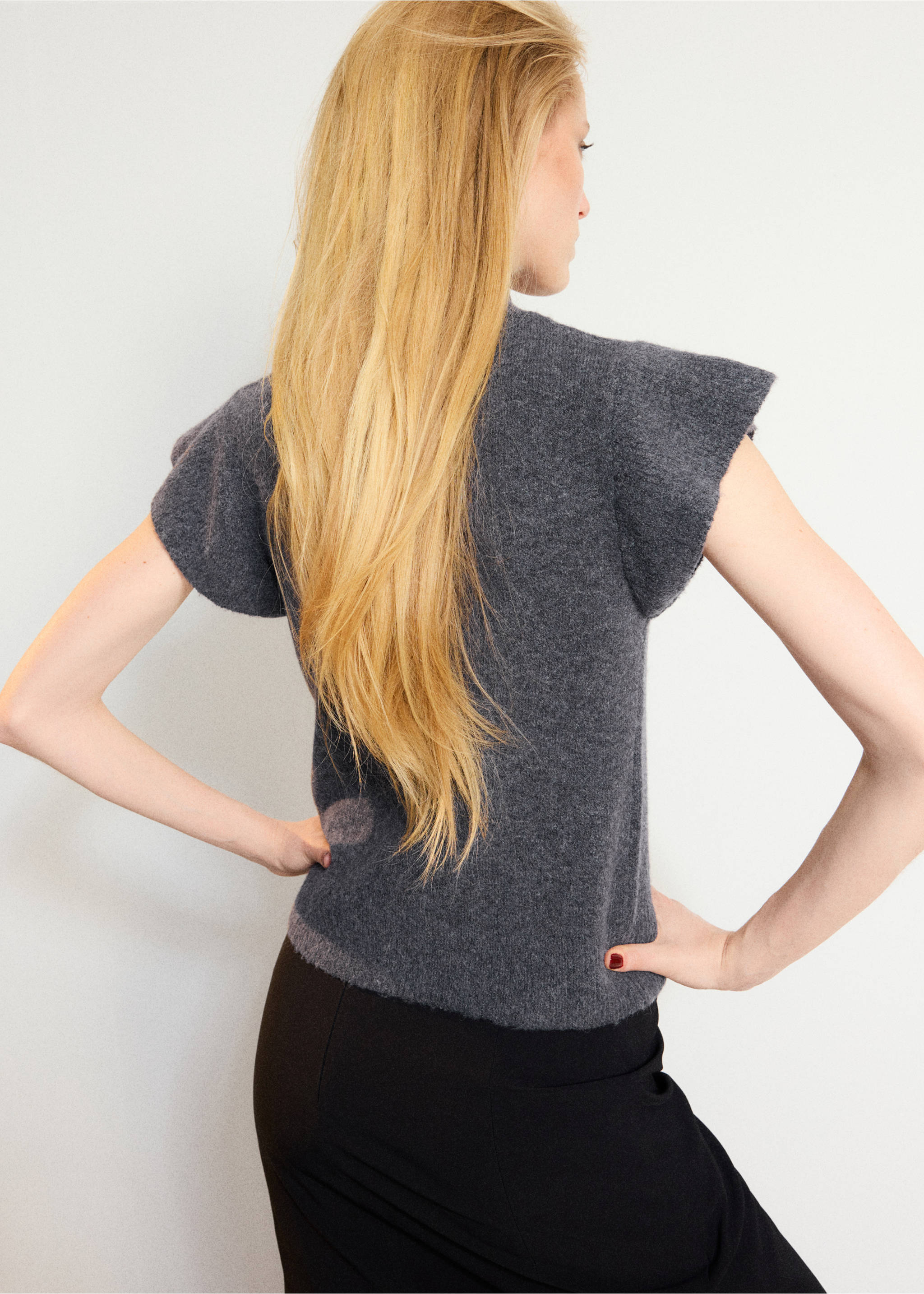Dark grey knitted jersey with short fluted sleeves, shown from the back., Charcoal. Ref: 37007806-00.