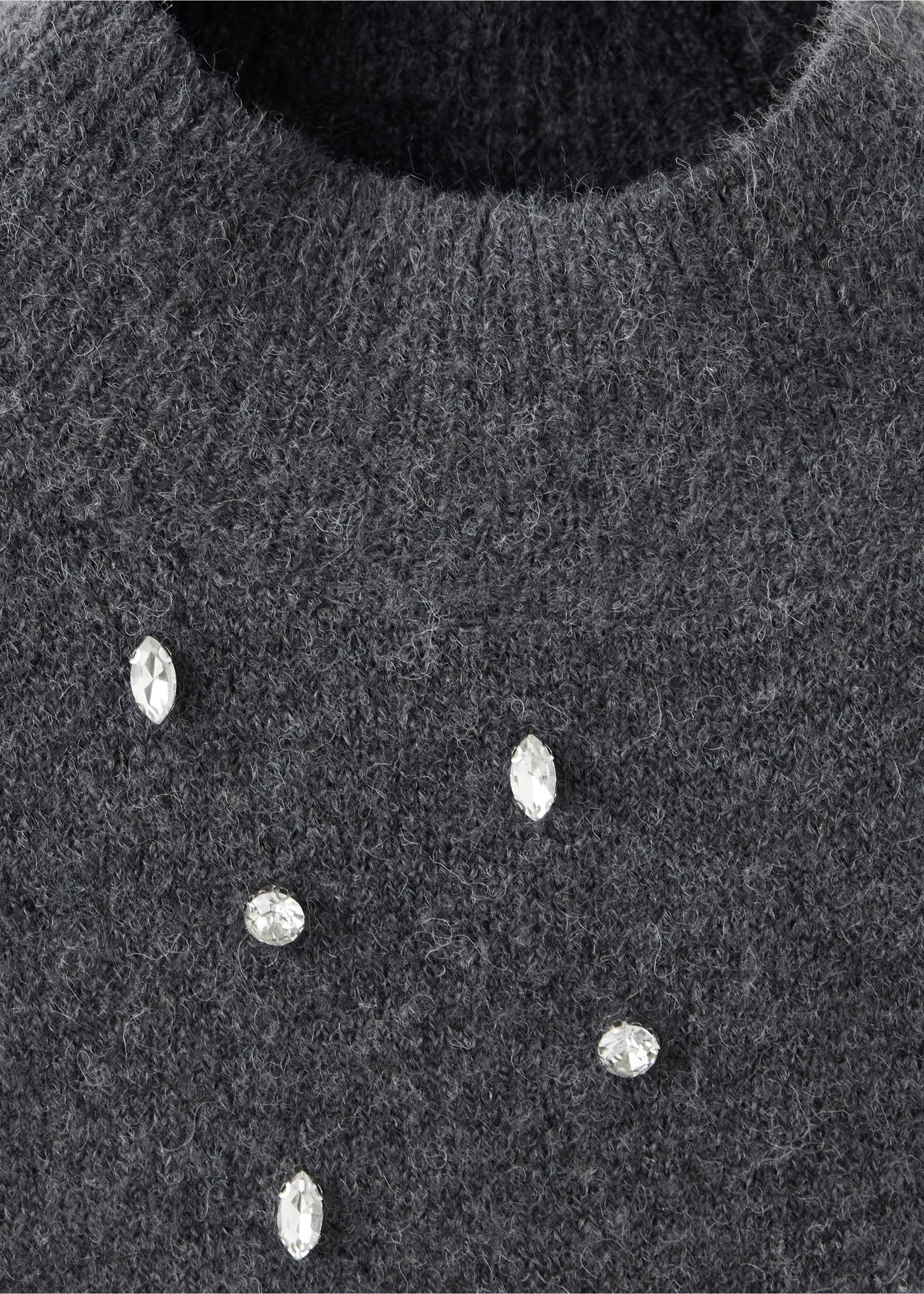 Close-up of a dark grey knit jersey with crystal rhinestone embellishments., Charcoal. Ref: 37007806-00.
