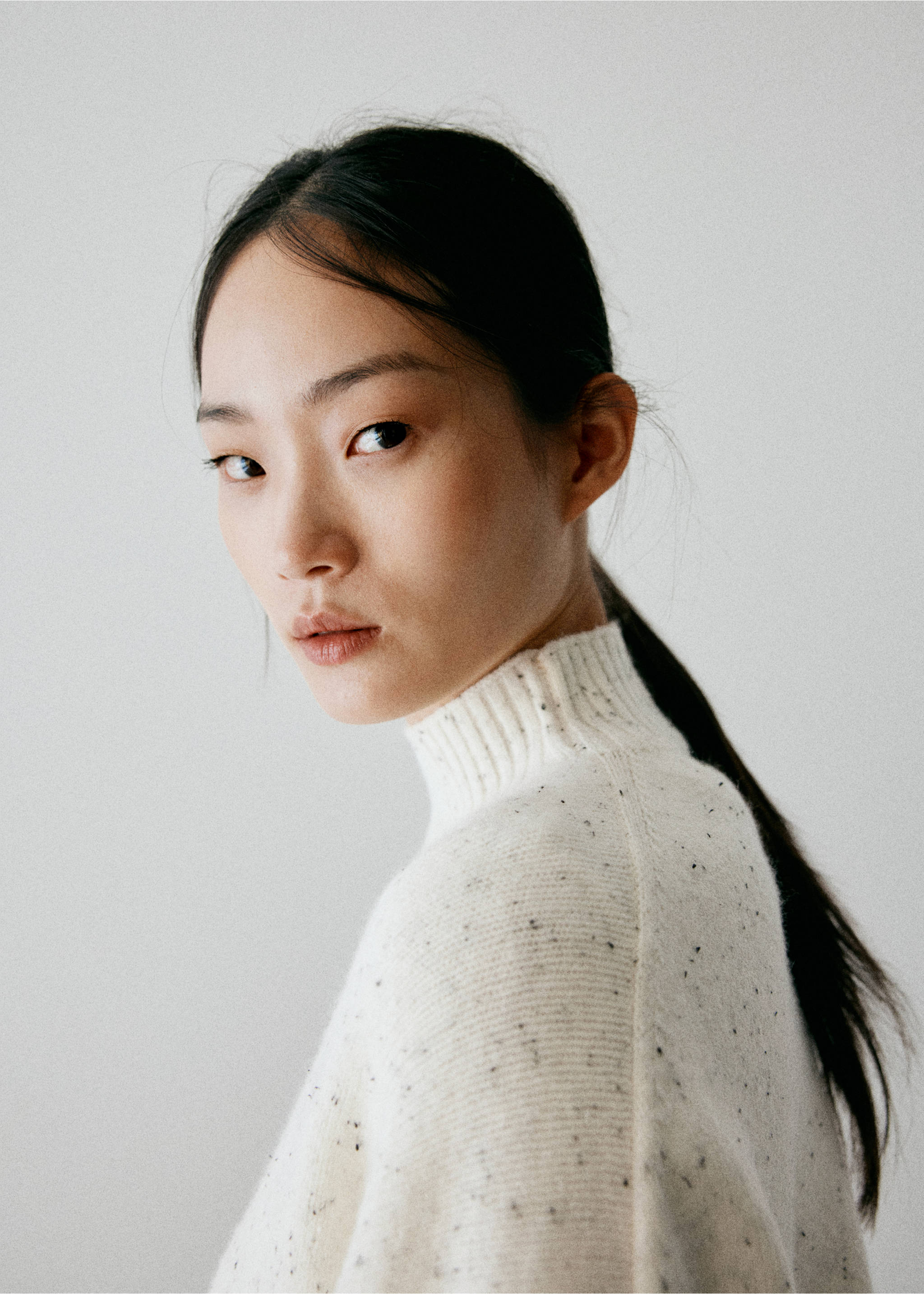 Cream speckled high-neck jumper in a close-up e-commerce view., Ecru. Ref: 37007812-00.