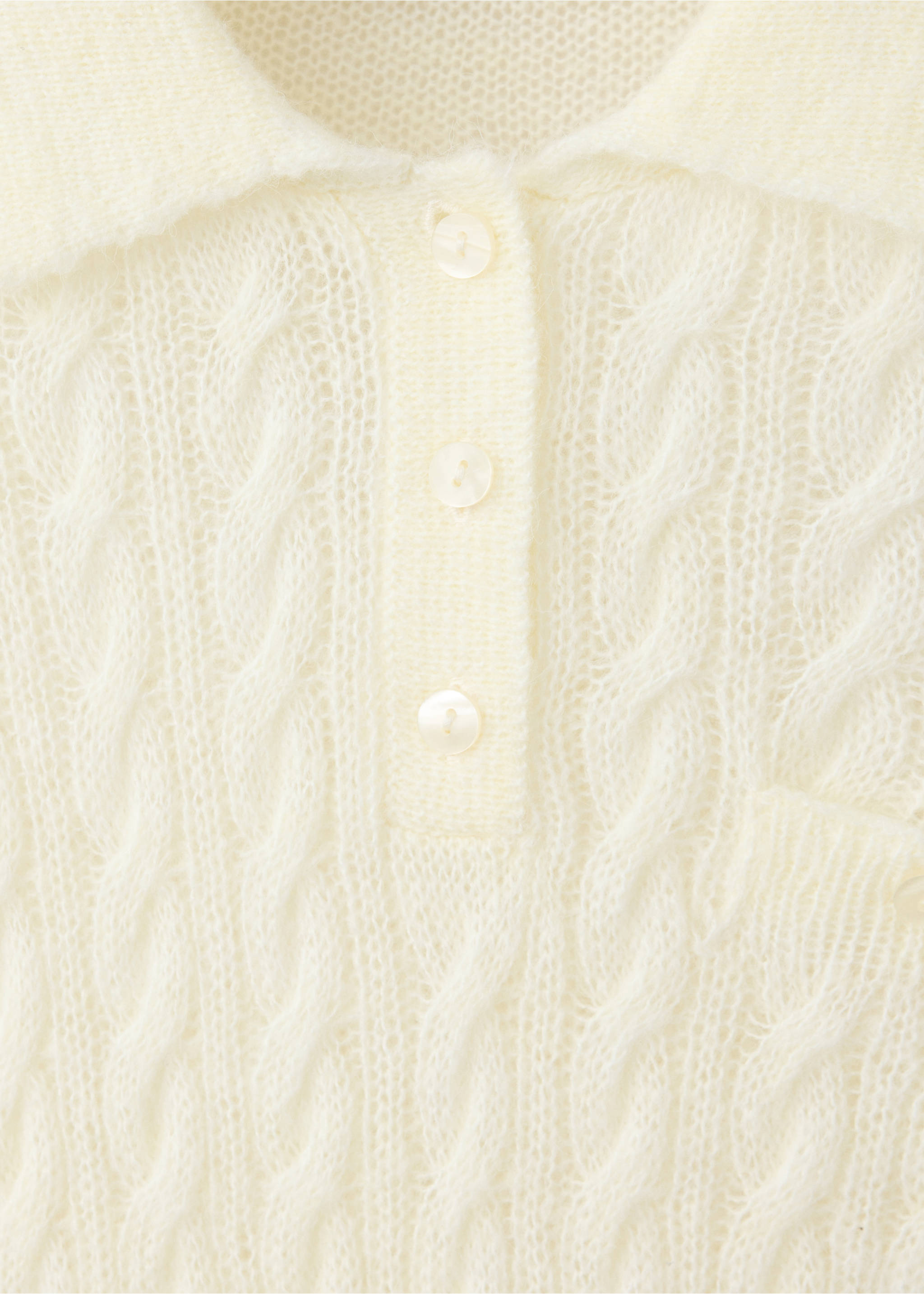 Jersey trenzado cuello polo - Detalle del artículo 8, Vainilla. Ref: 37007818-00.
