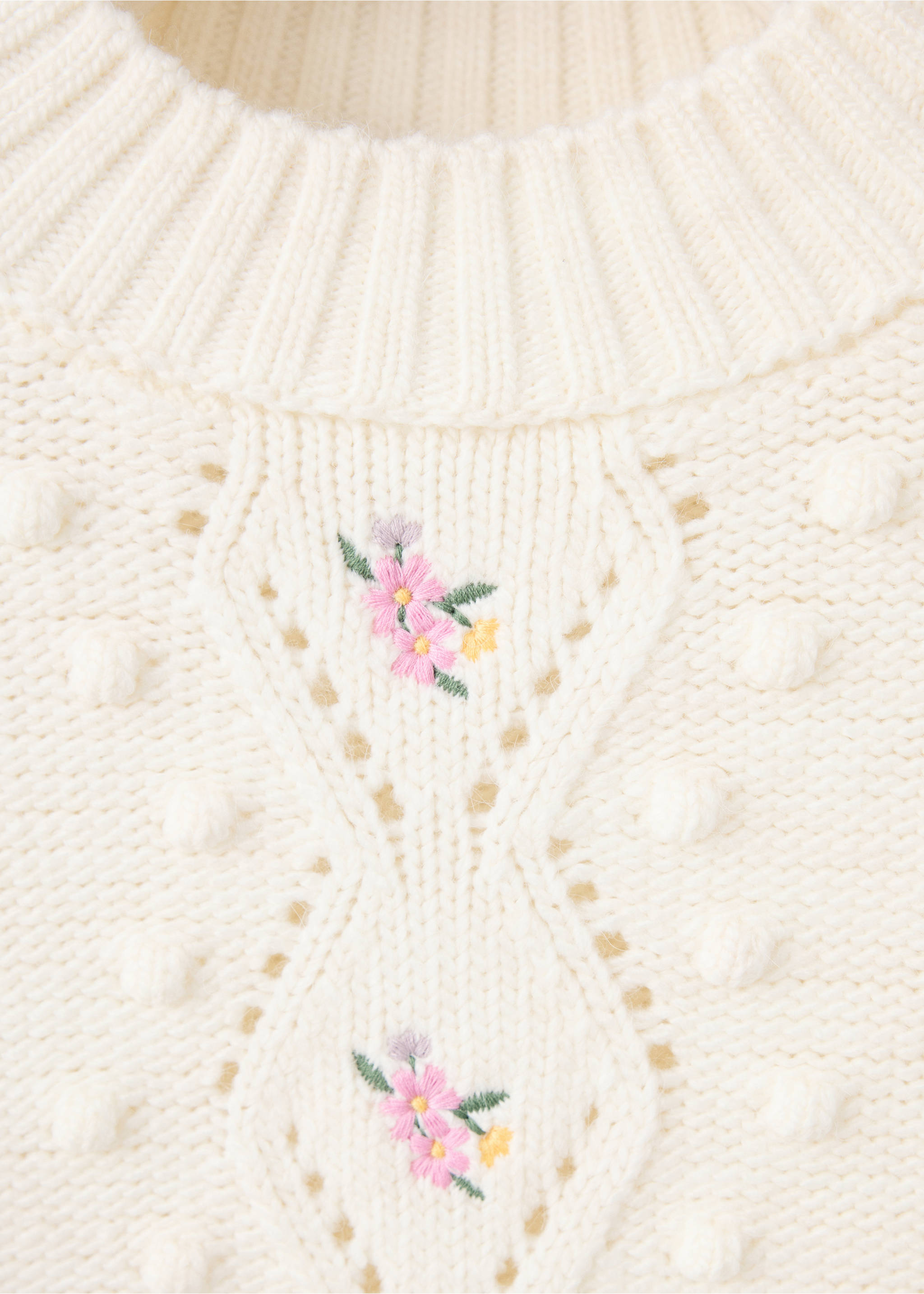 Close-up of an off-white knit jumper with floral embroidery and bobbles., Ecru. Ref: 37007820-00.
