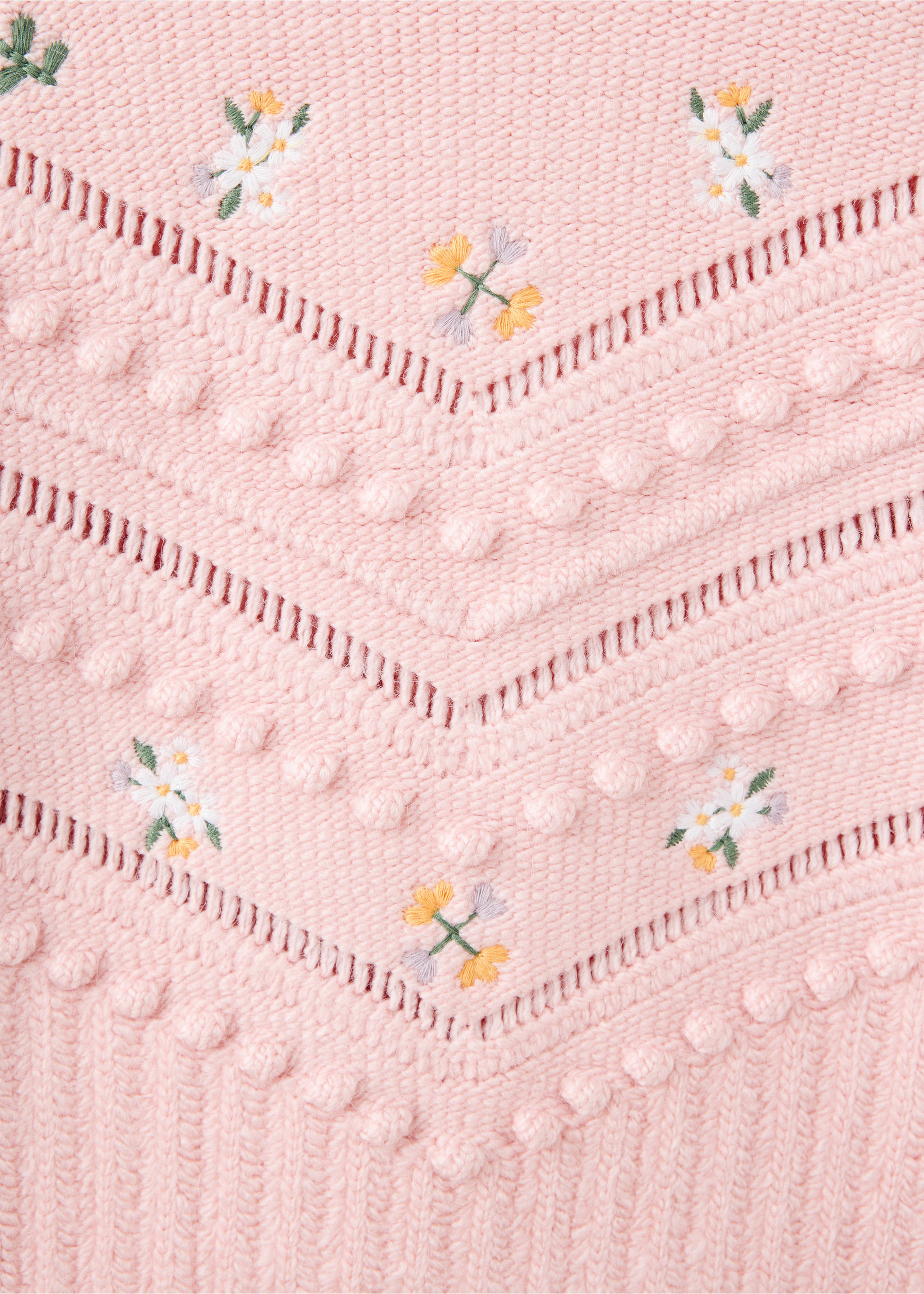 Close-up of a pink knit sweater with floral embroidery and bobble details., Pink. Ref: 37007821-00.
