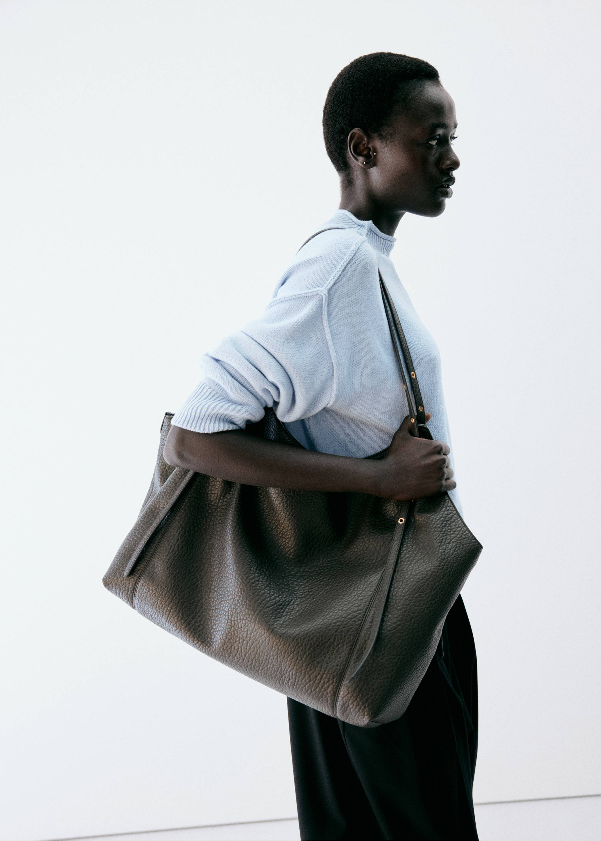 Light blue jersey with mock neck and ribbed trims, worn with a shoulder bag., Sky Blue. Ref: 37007826-00.