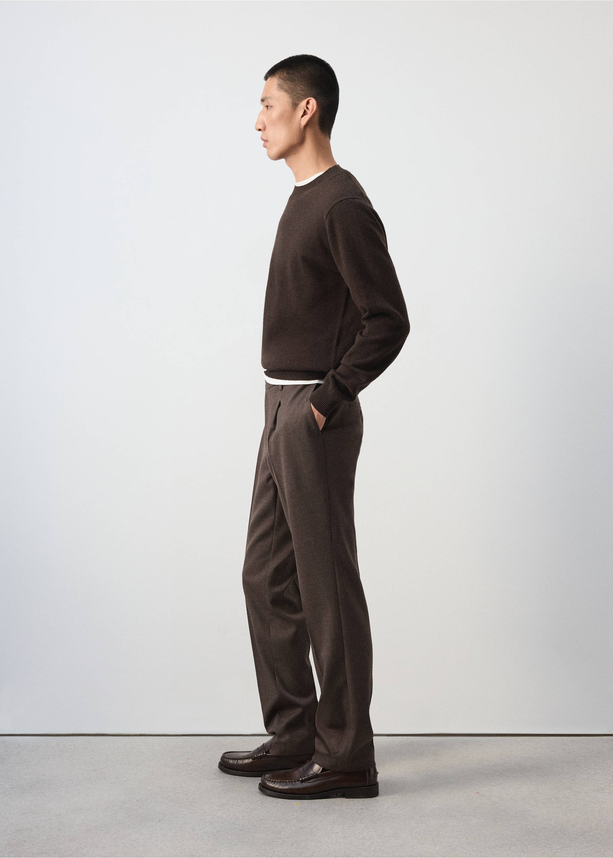 Brown straight-leg trousers worn with a brown sweater and dark leather loafers., Chocolate. Ref: 37007888-00.