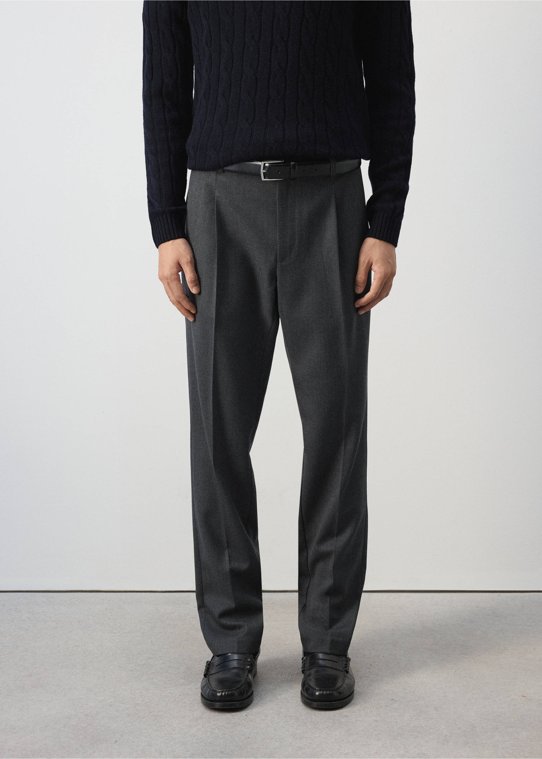 Dark grey pleated trousers worn with a black belt and navy jumper., Charcoal. Ref: 37007888-00.