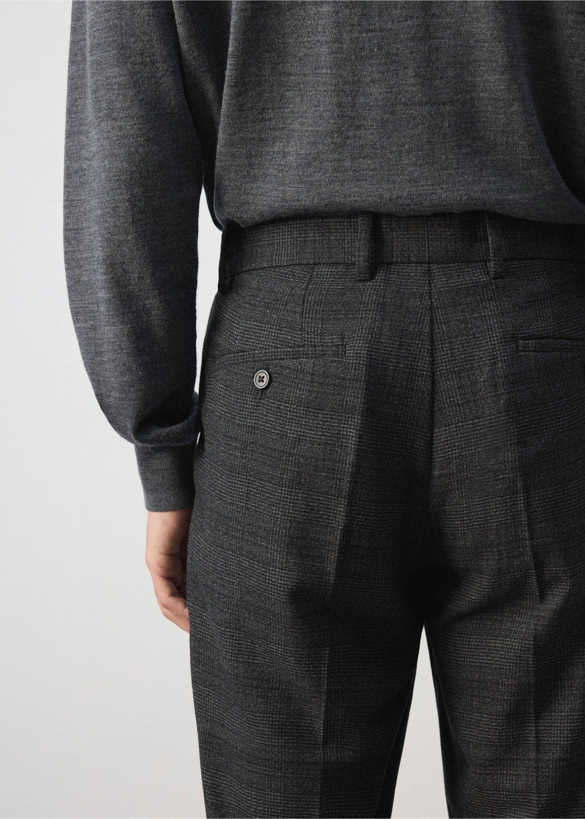Dark grey plaid trousers with belt loops and a back button pocket, back view., Dark Heather Grey. Ref: 37007891-00.