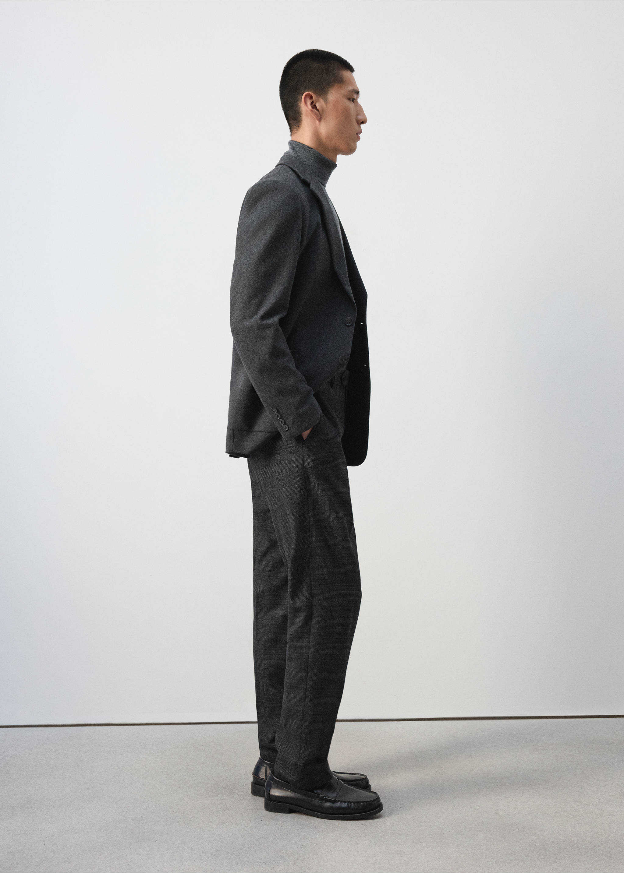 Dark grey straight-leg trousers in a subtle check pattern, styled with a matching blazer., Dark Heather Grey. Ref: 37007891-00.