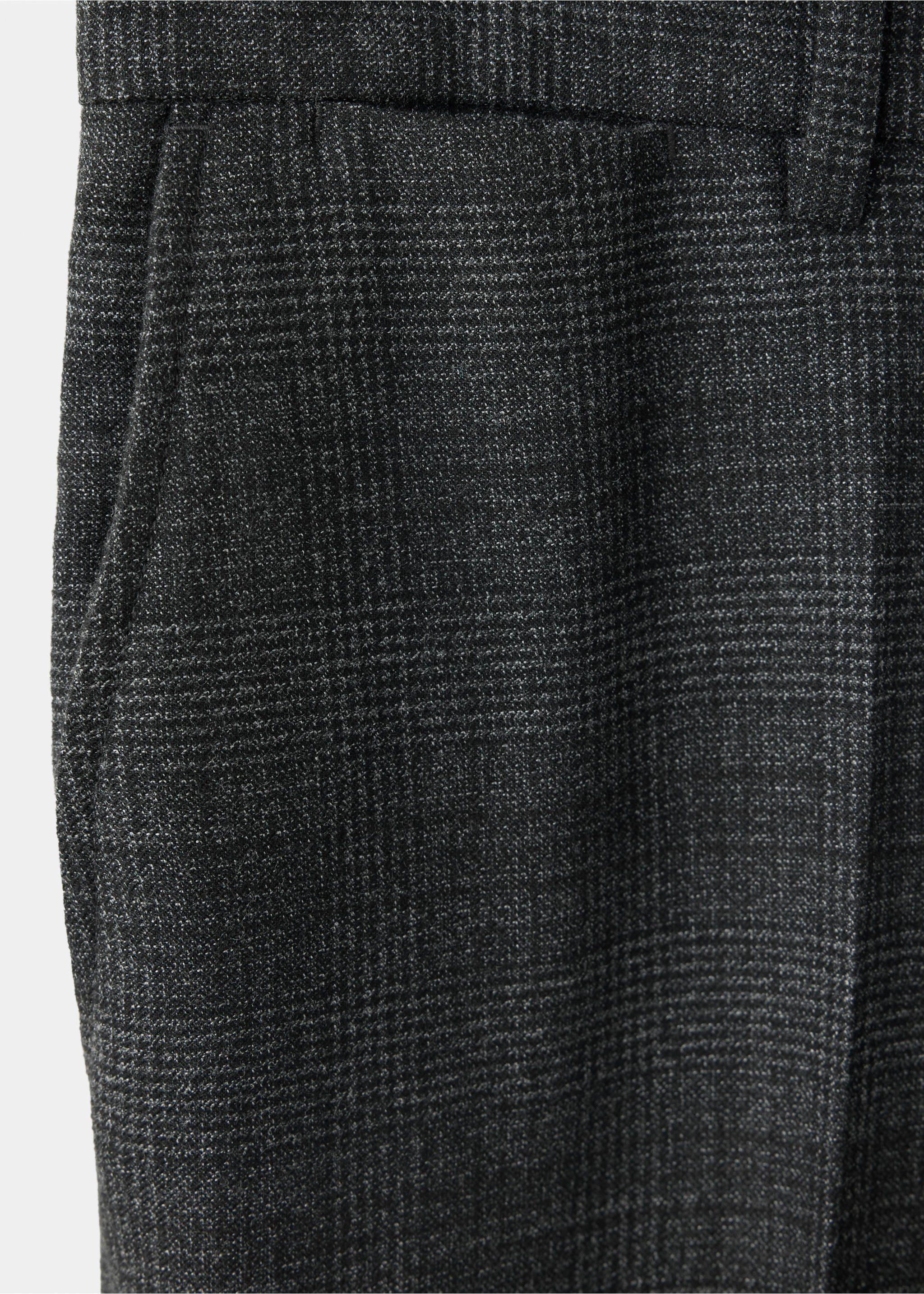 Close-up of dark grey checked trousers fabric detail., Dark Heather Grey. Ref: 37007891-00.