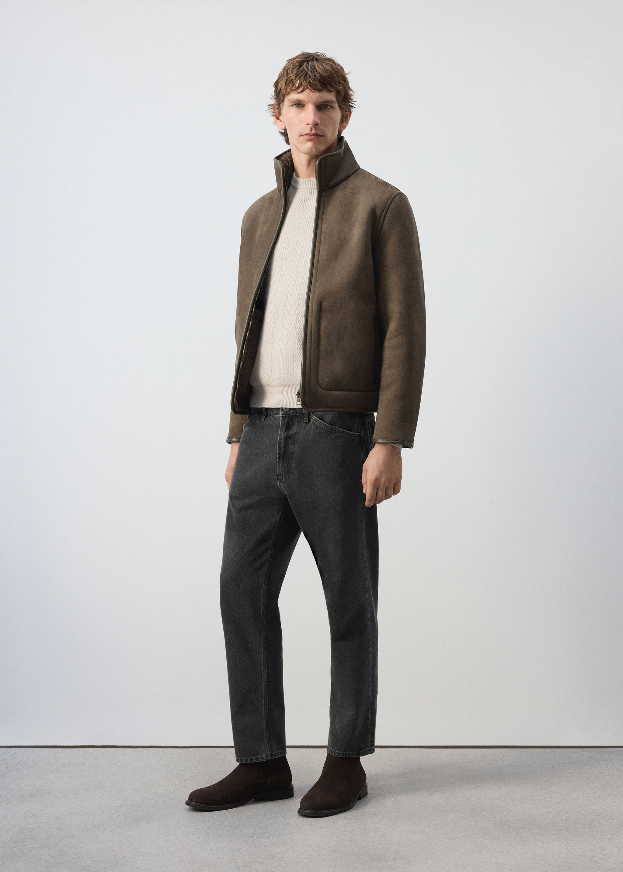 Brown faux-shearling jacket with a high collar and front zip, worn over a cream jumper and dark jeans., Olive Green. Ref: 37007894-00.
