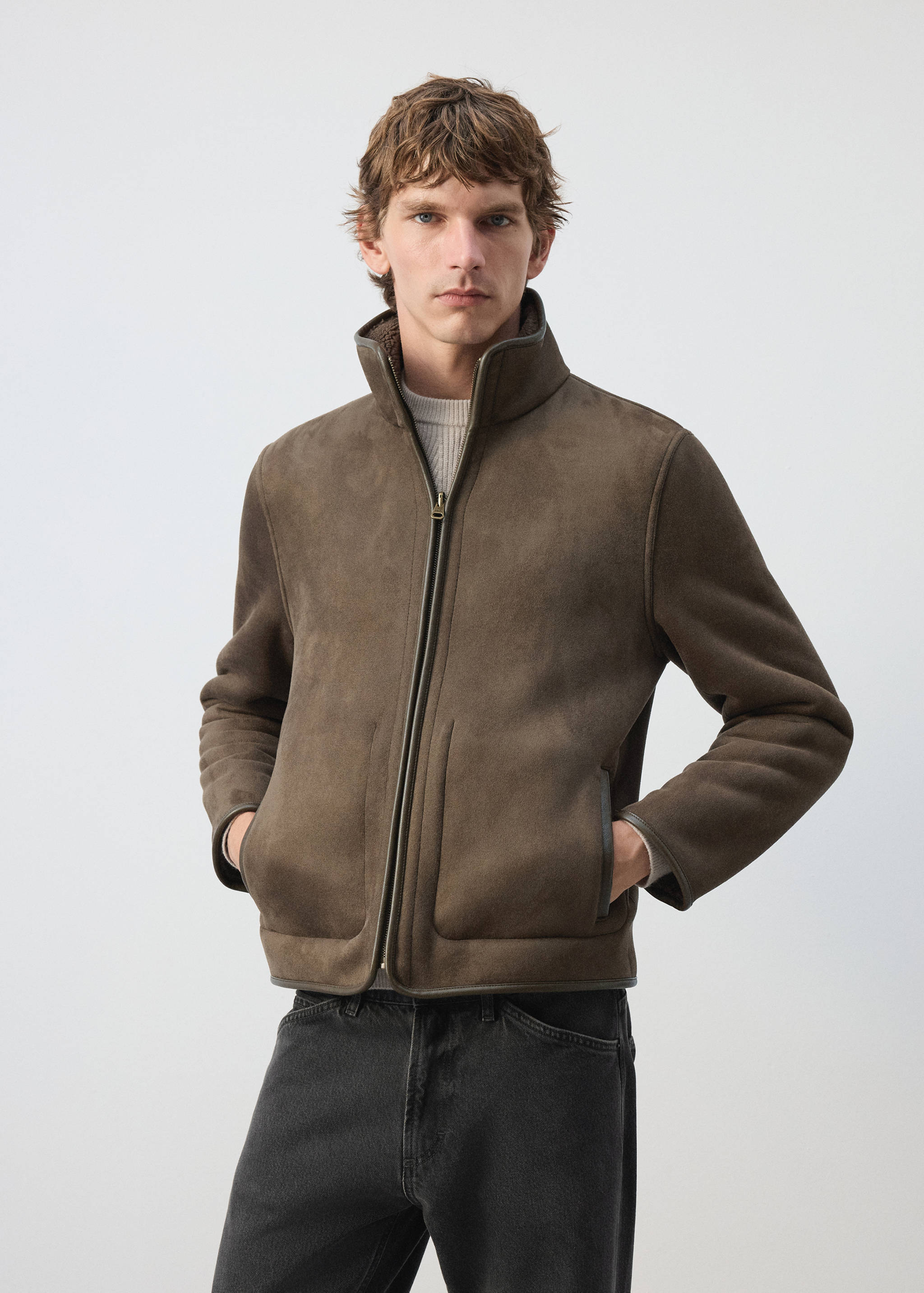 Brown suede-effect zip-up jacket with a high collar and trim.